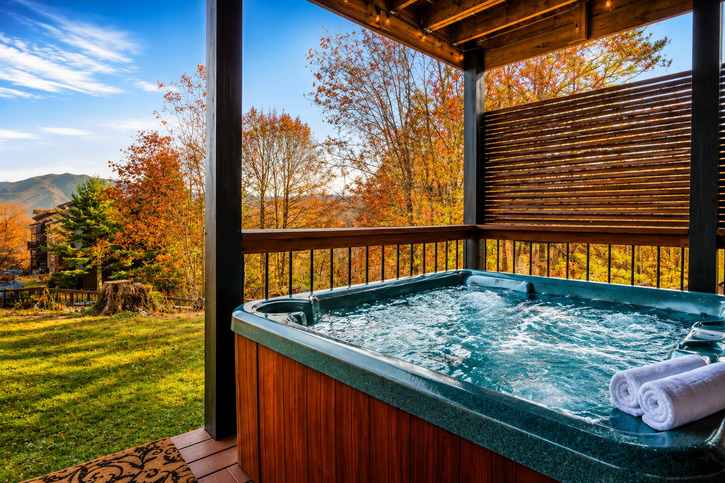 Relax together in the private bubbling hot tub while surrounded by gorgeous fall colors and peaceful Smoky Mountain views—the perfect way for the family to unwind after a fun day exploring Gatlinburg!