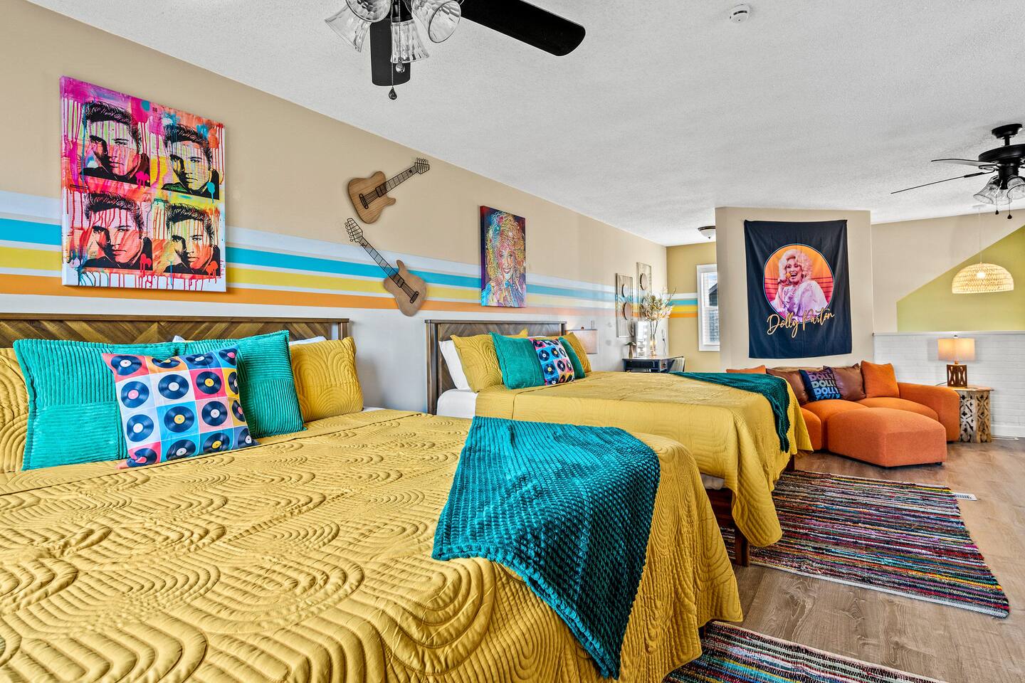 A spacious, colorful bedroom perfect for families, with two comfortable beds and a cozy sitting area. Fun music-inspired décor and playful Dolly Parton touches make this a memorable Smoky Mountain retreat for kids and adults alike!
