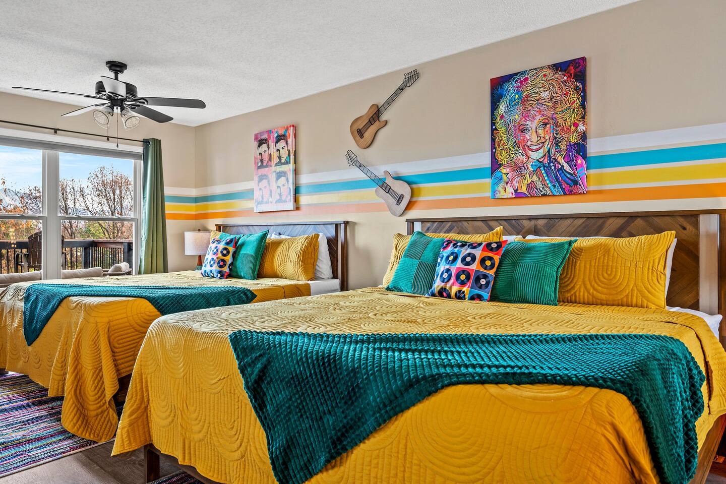 A colorful, music-inspired bedroom the whole family will love! Two comfortable beds provide plenty of sleeping space, while playful décor and direct deck access create a fun retreat for relaxing after a day in the Smokies.