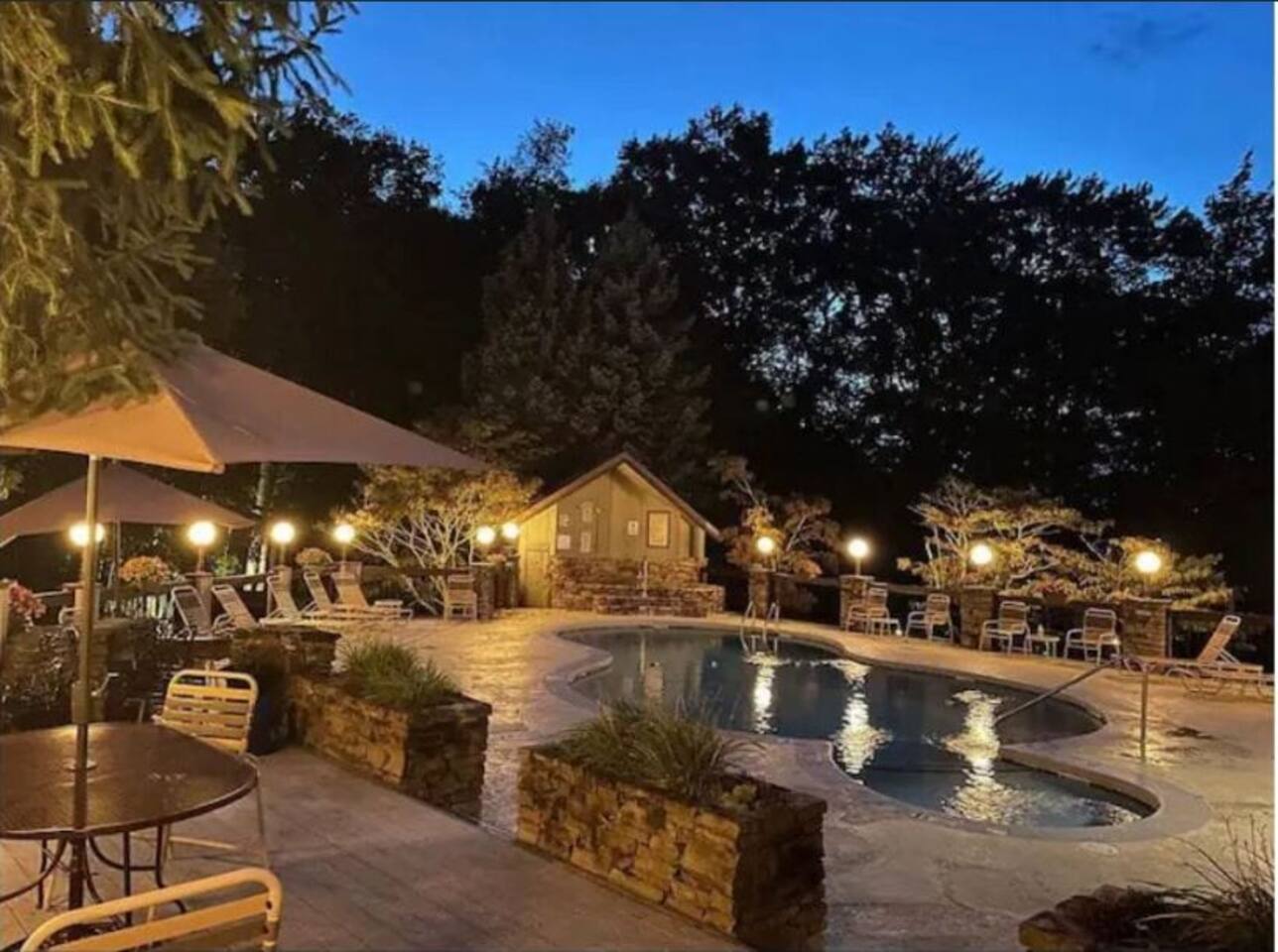 A night time view of the community pool.