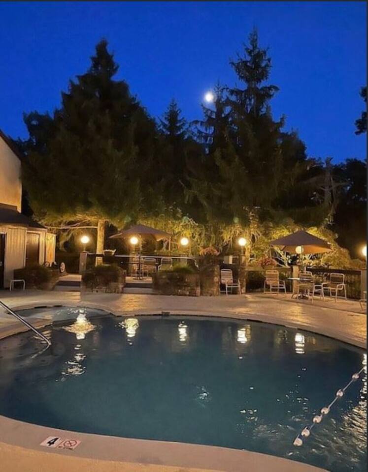 Another night time photo of the community pool.