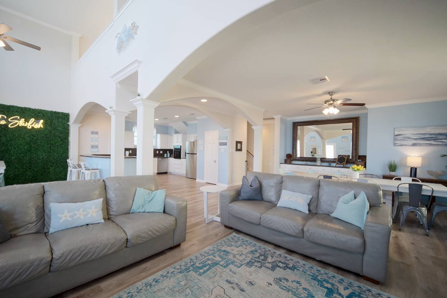 Open living room with ocean-facing windows