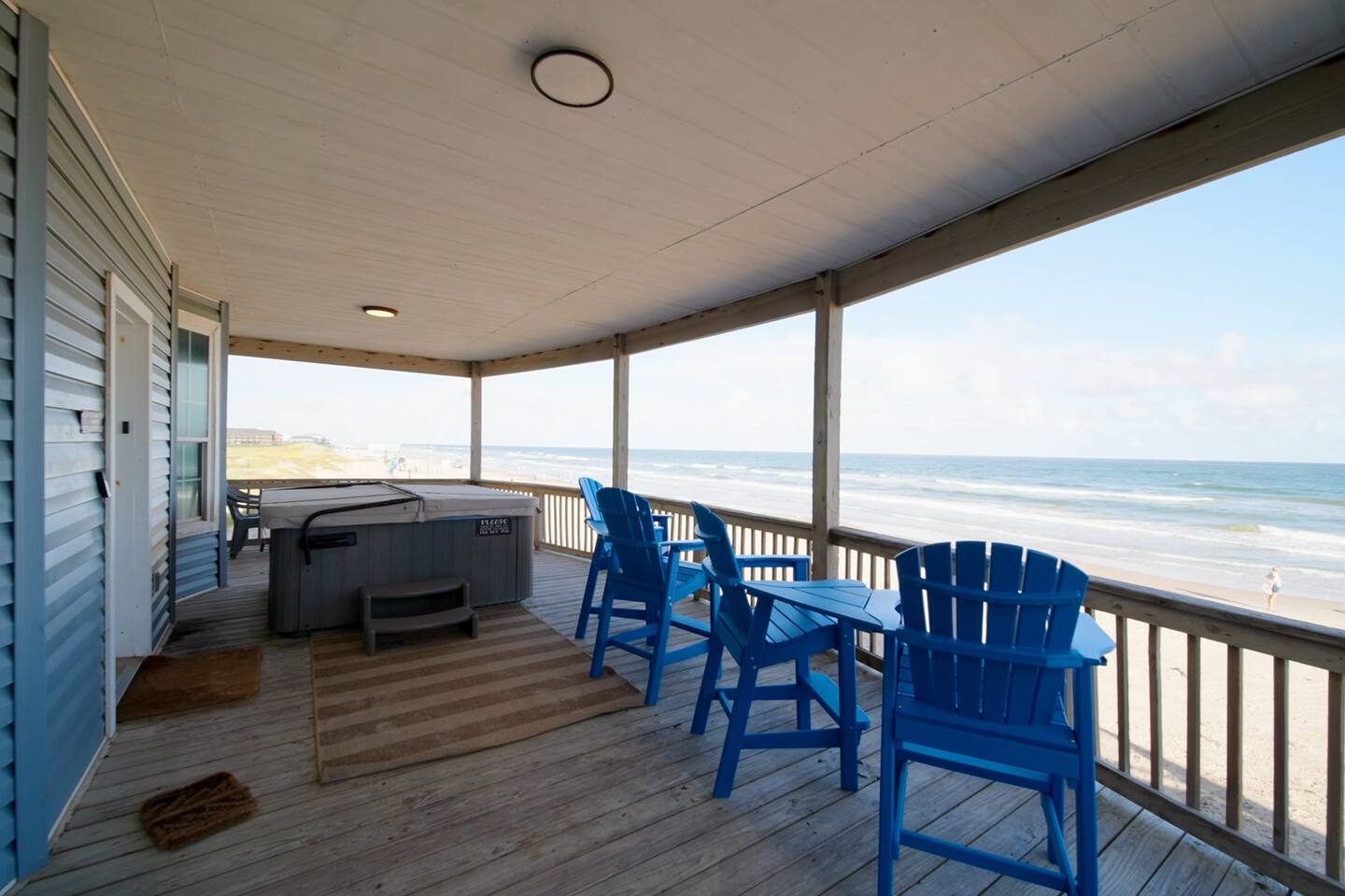 Tide & Tub — beachfront Surfside Beach home with a hot tub on the deck