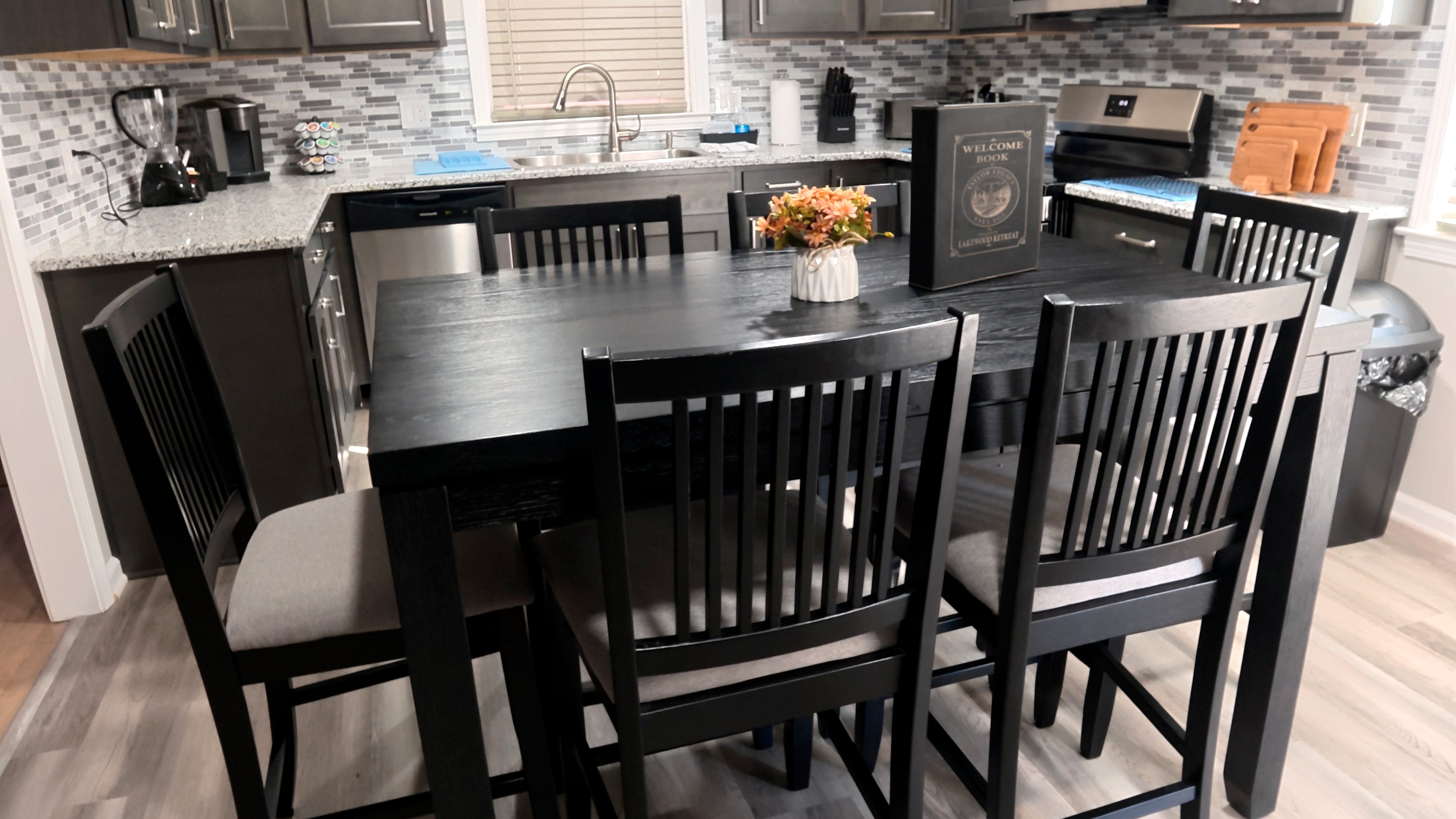 Modern kitchen with dining for 6, stainless appliances & stylish finishes