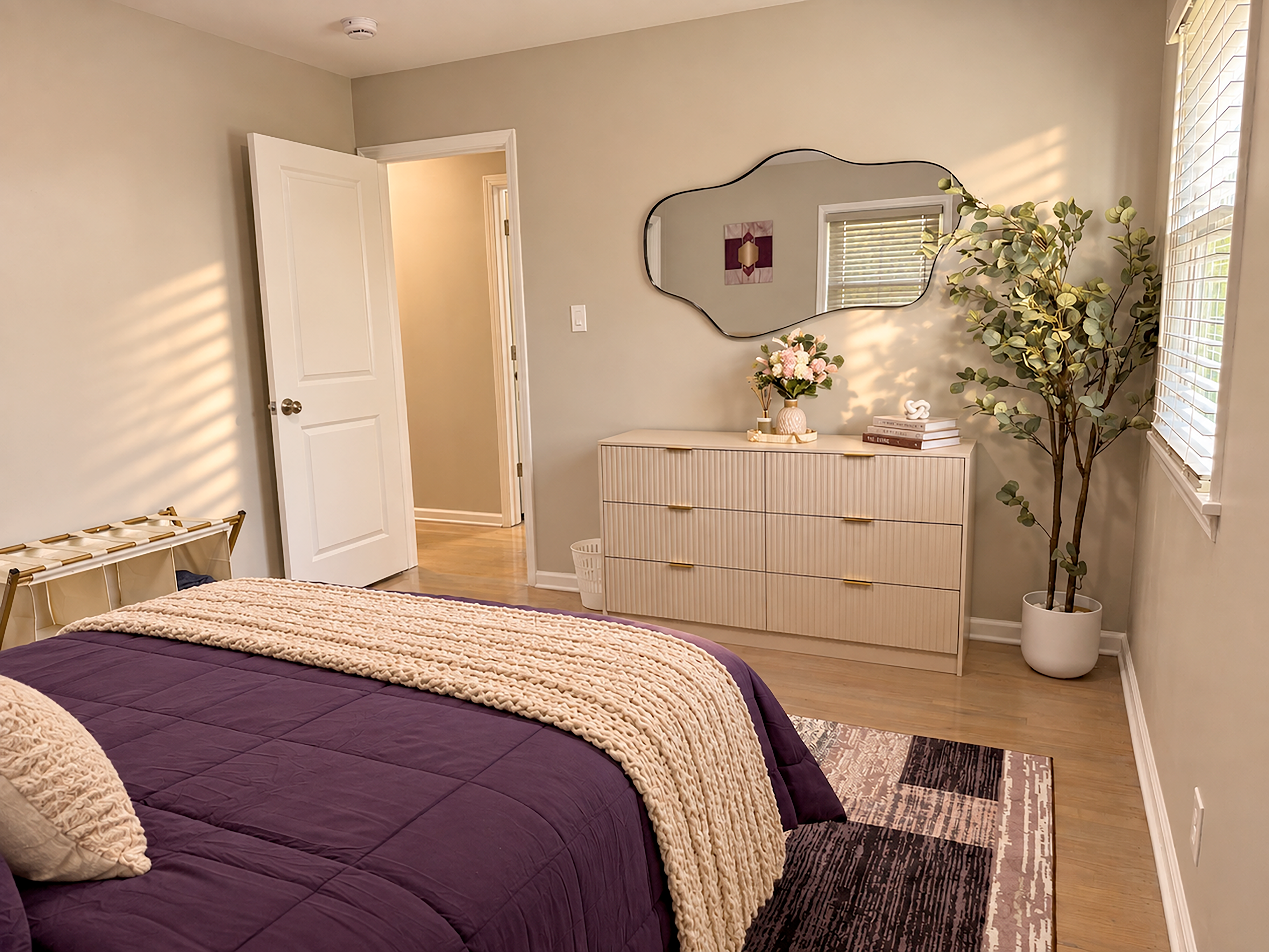 Bright, stylish bedroom with natural light and elegant modern decor