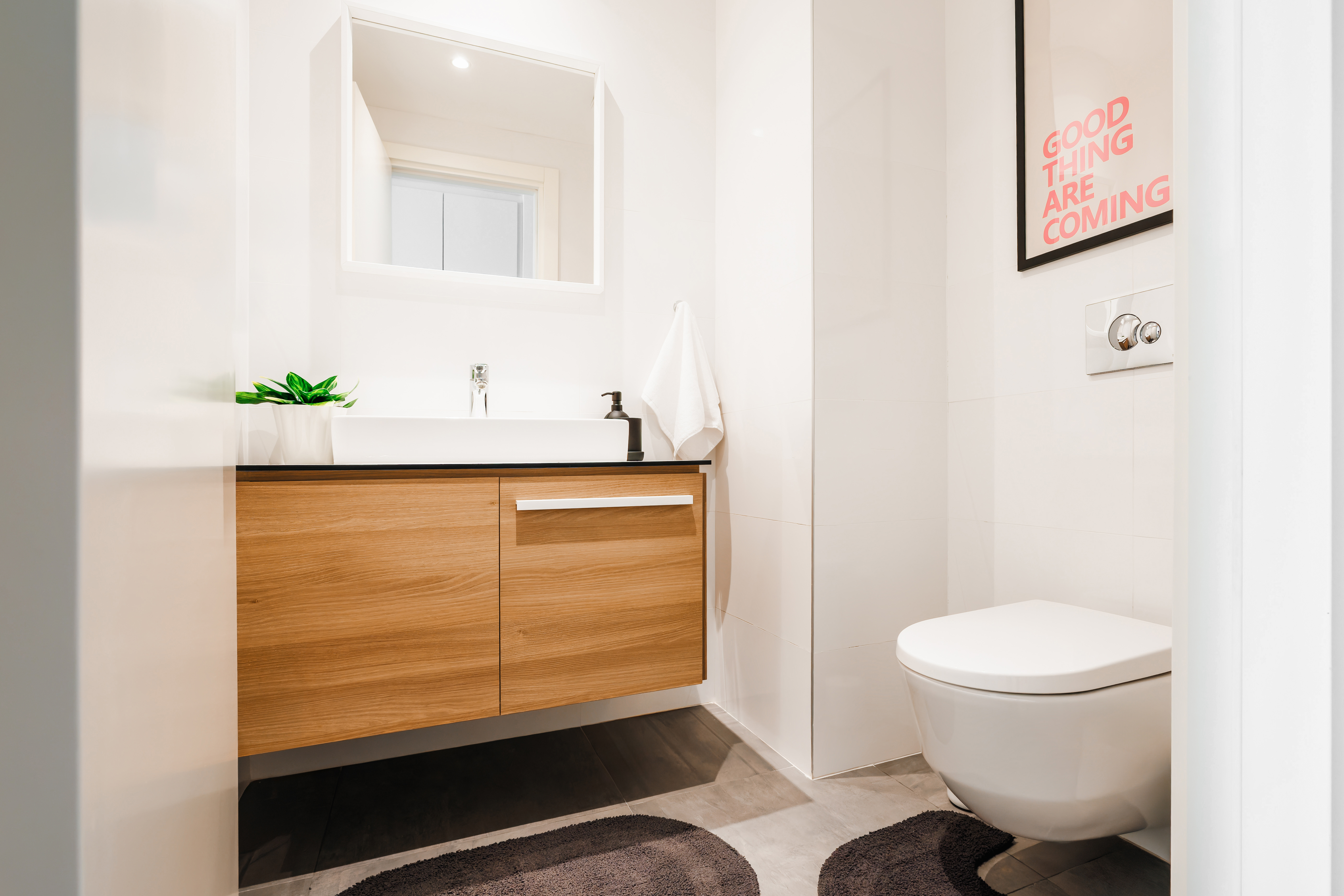 Bright modern bathroom with floating vanity and sleek contemporary finishes