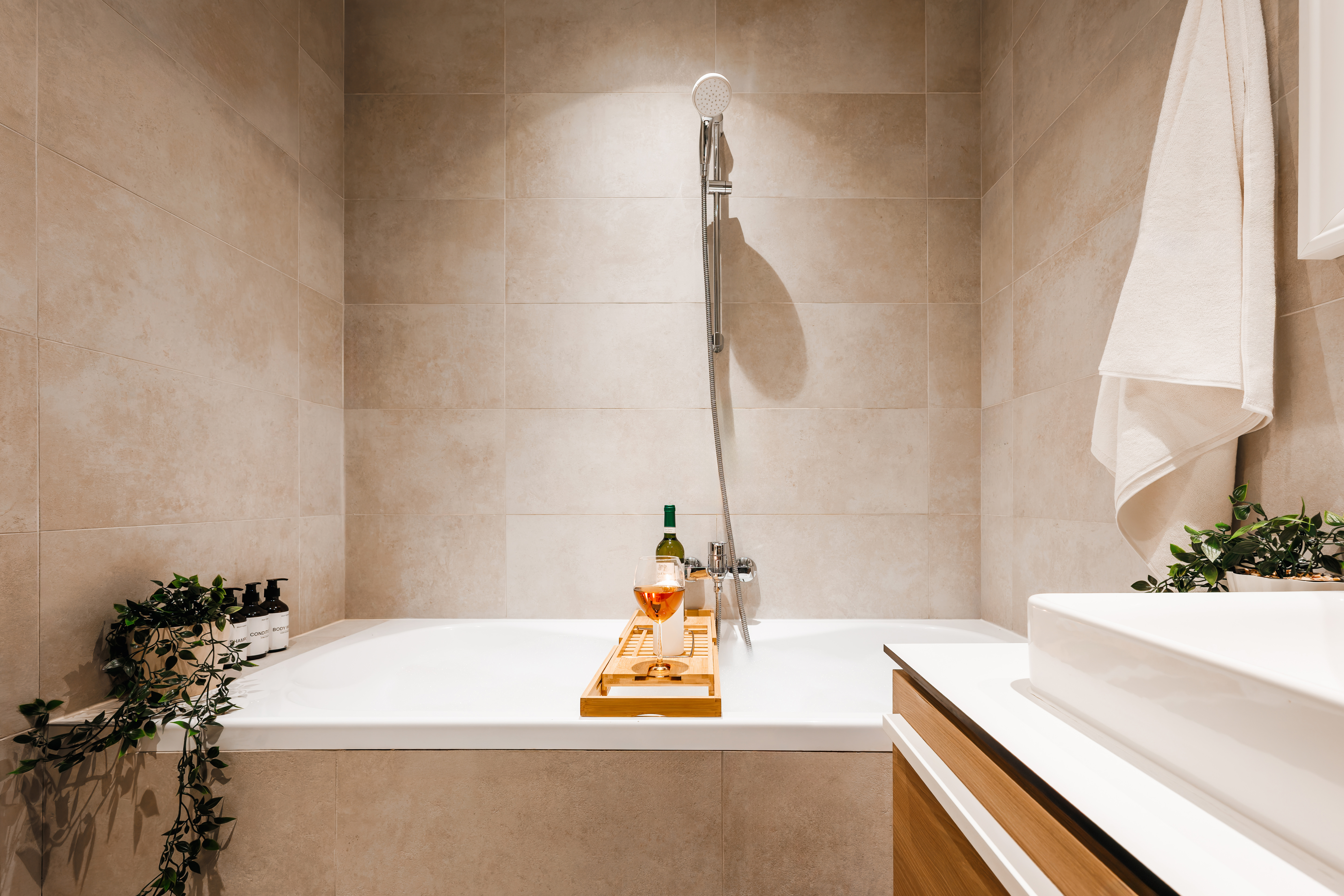 Spa-inspired bathroom with soaking tub and elegant modern finishes