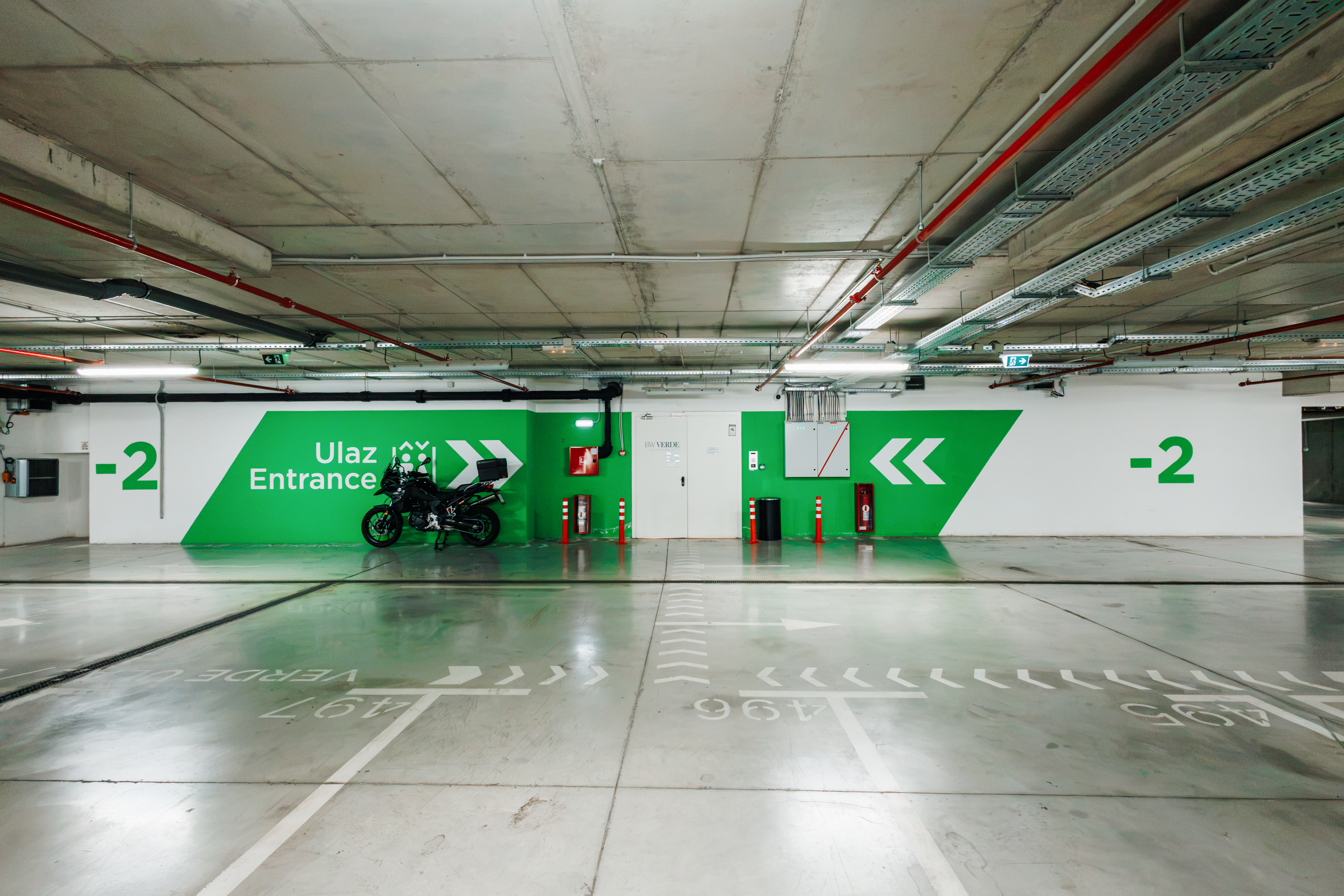 Clean, secure underground parking with clear signage and easy access