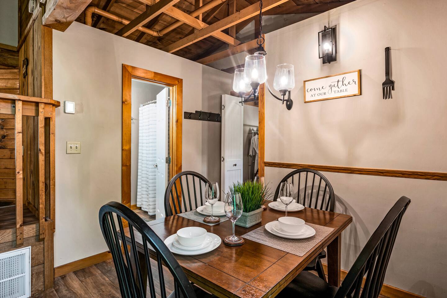 Enjoy meals in this bright dining space, where natural light flows in from nearby windows. The open-concept design makes it easy to serve meals from the kitchen and stay connected with everyone in the living room.