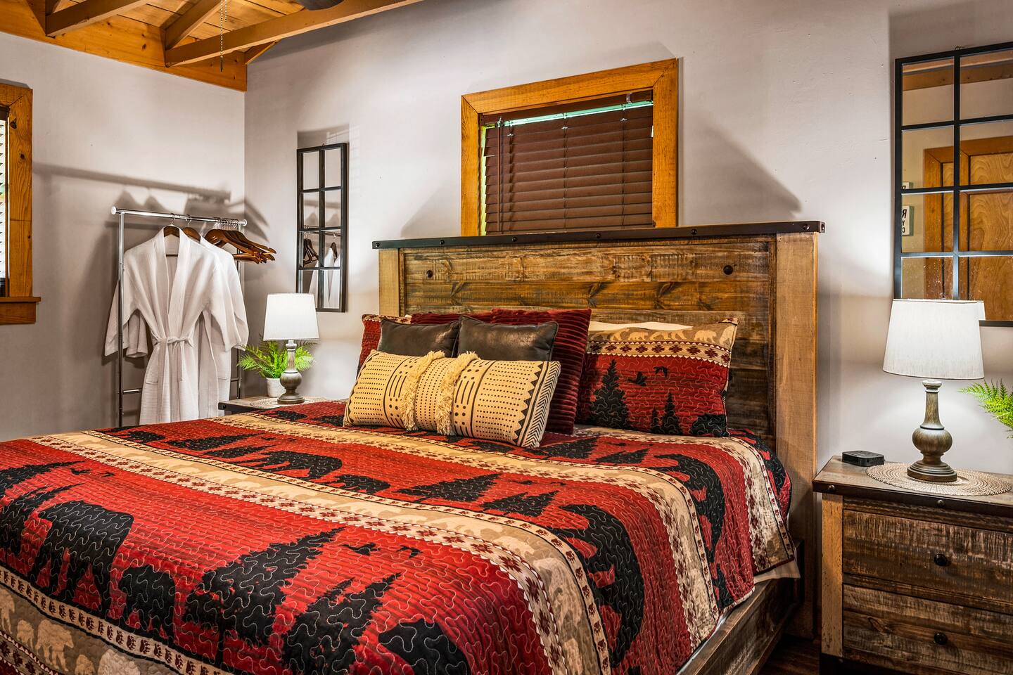 Master bedroom with a spacious and comfortable king bed.