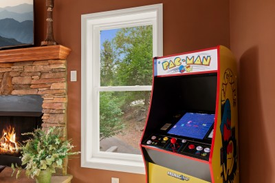 A full-size Pac-Man arcade cabinet stands right next to the fireplace in the lower-level den. Expect a high-score rivalry to start on the first night and the leaderboard to be the main topic at breakfast every morning for the rest of the week.