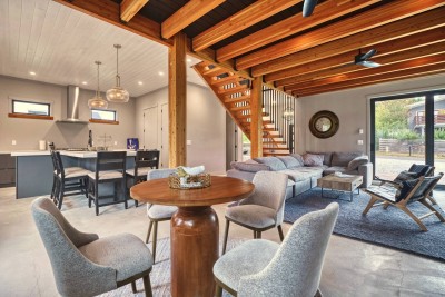 One big room: kitchen, dining and living under one timber ceiling