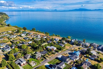 South Beach from above; the house sits a short walk from the shore