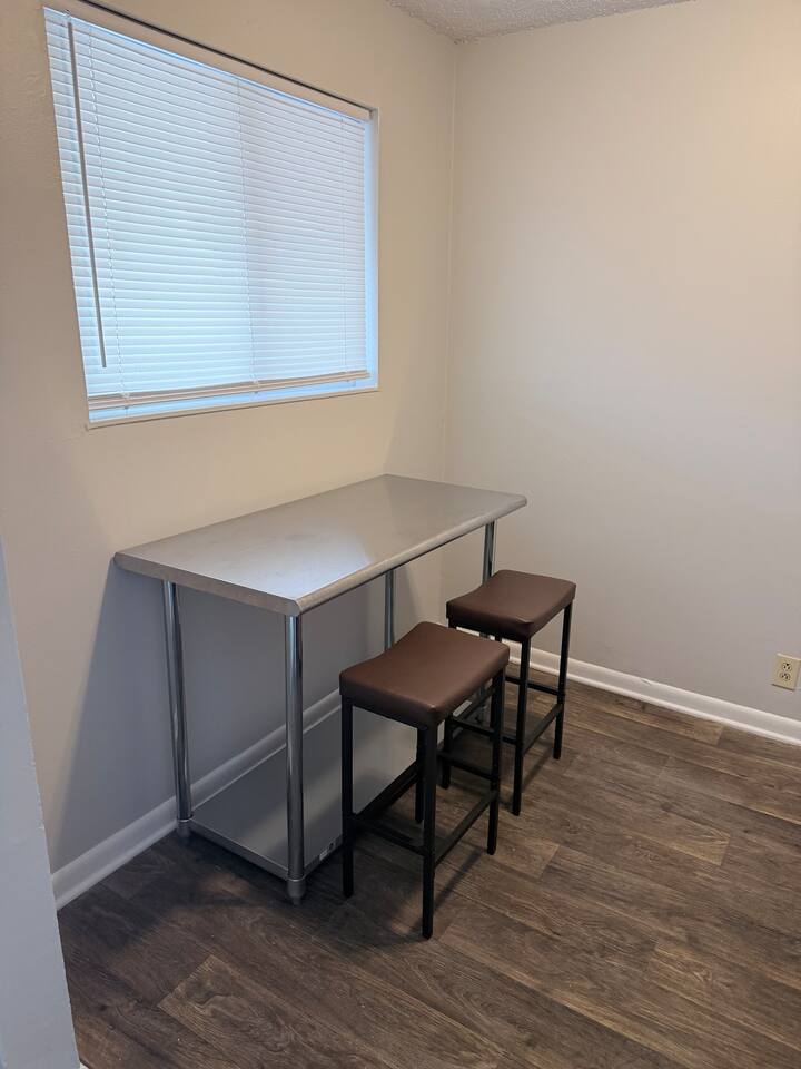 Dining area for two — also works well as an additional workspace.