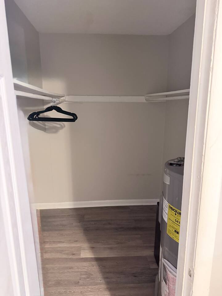 Oversized walk-in closet with plenty of storage for longer stays