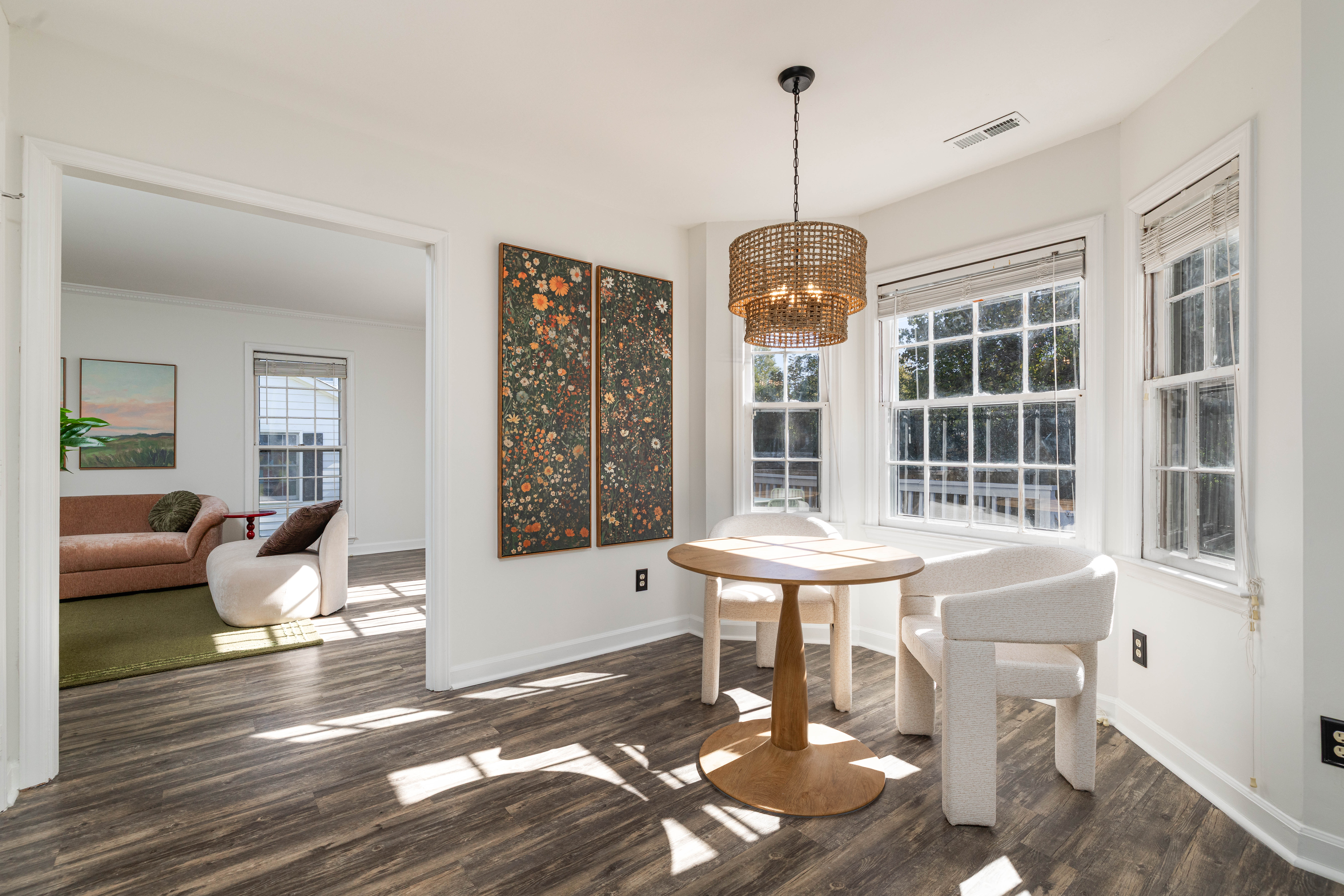 Main House breakfast nook in the bay window, looking through to the living room