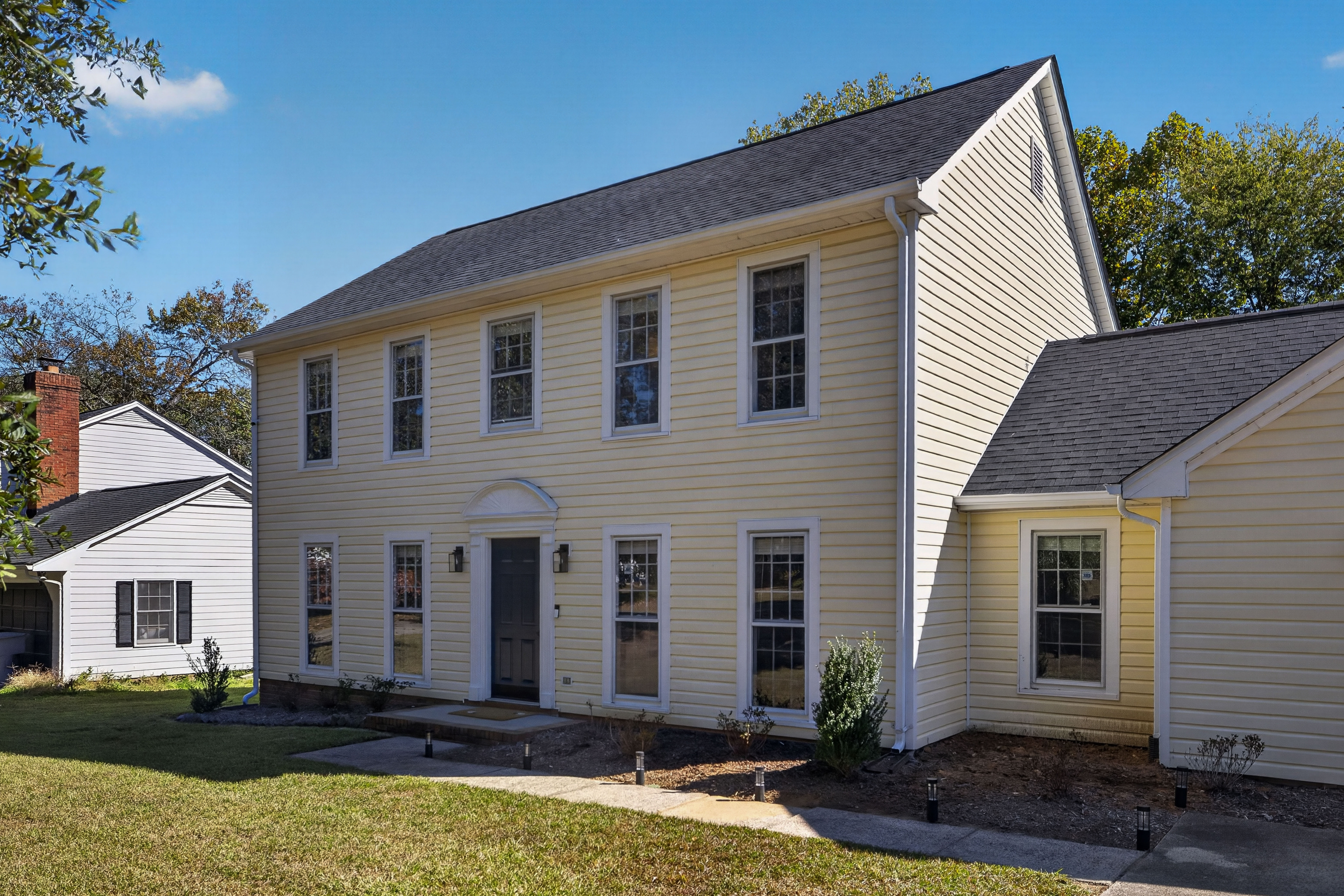The Main House from the side, with its front walk