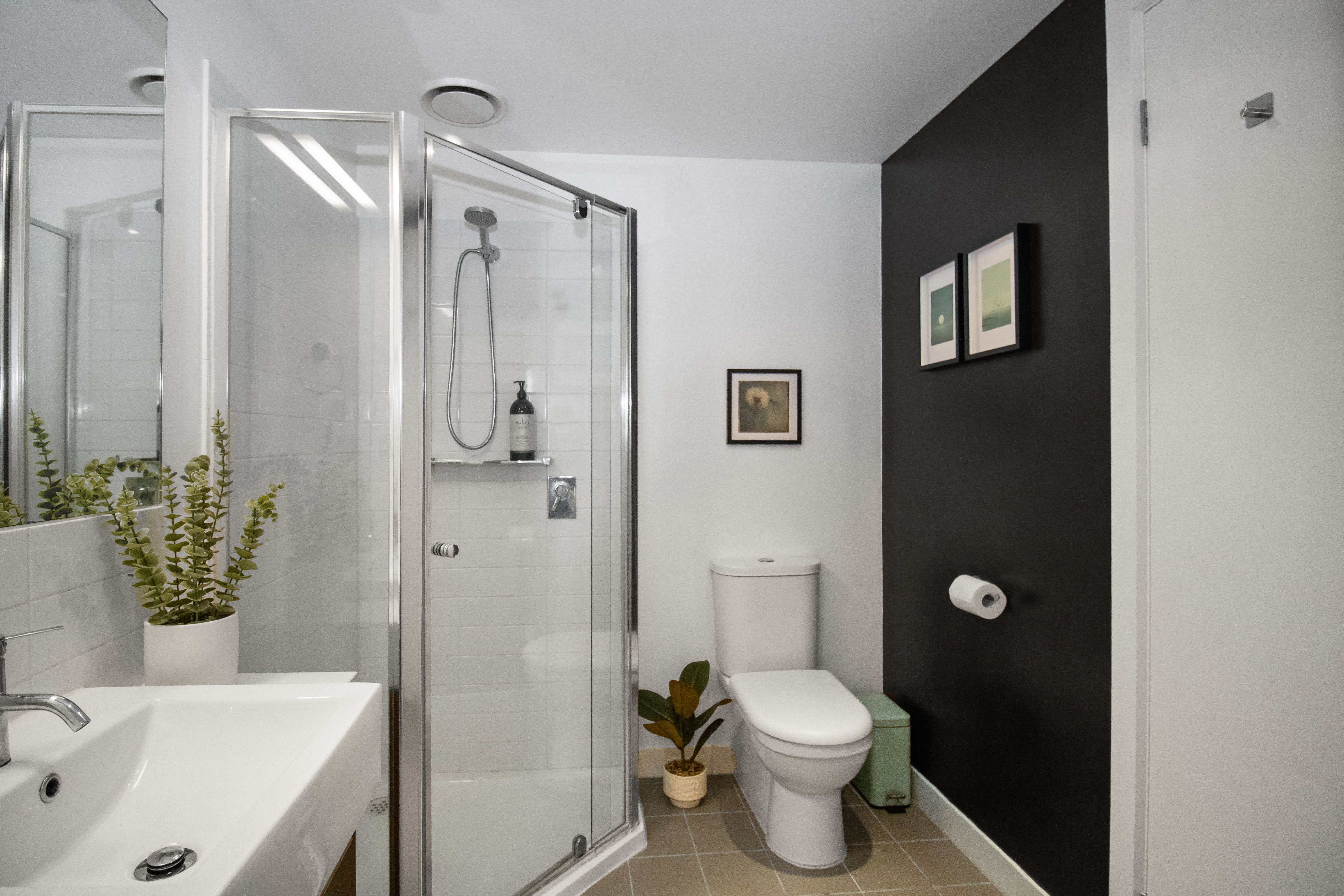Modern bathroom with glass shower and stylish designer touches