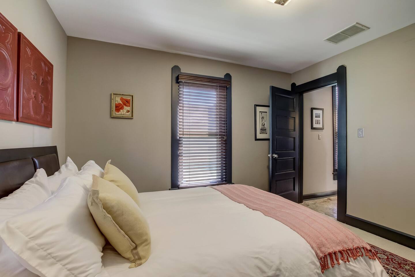The second queen master on the ground floor with easy access to the shared bathroom.