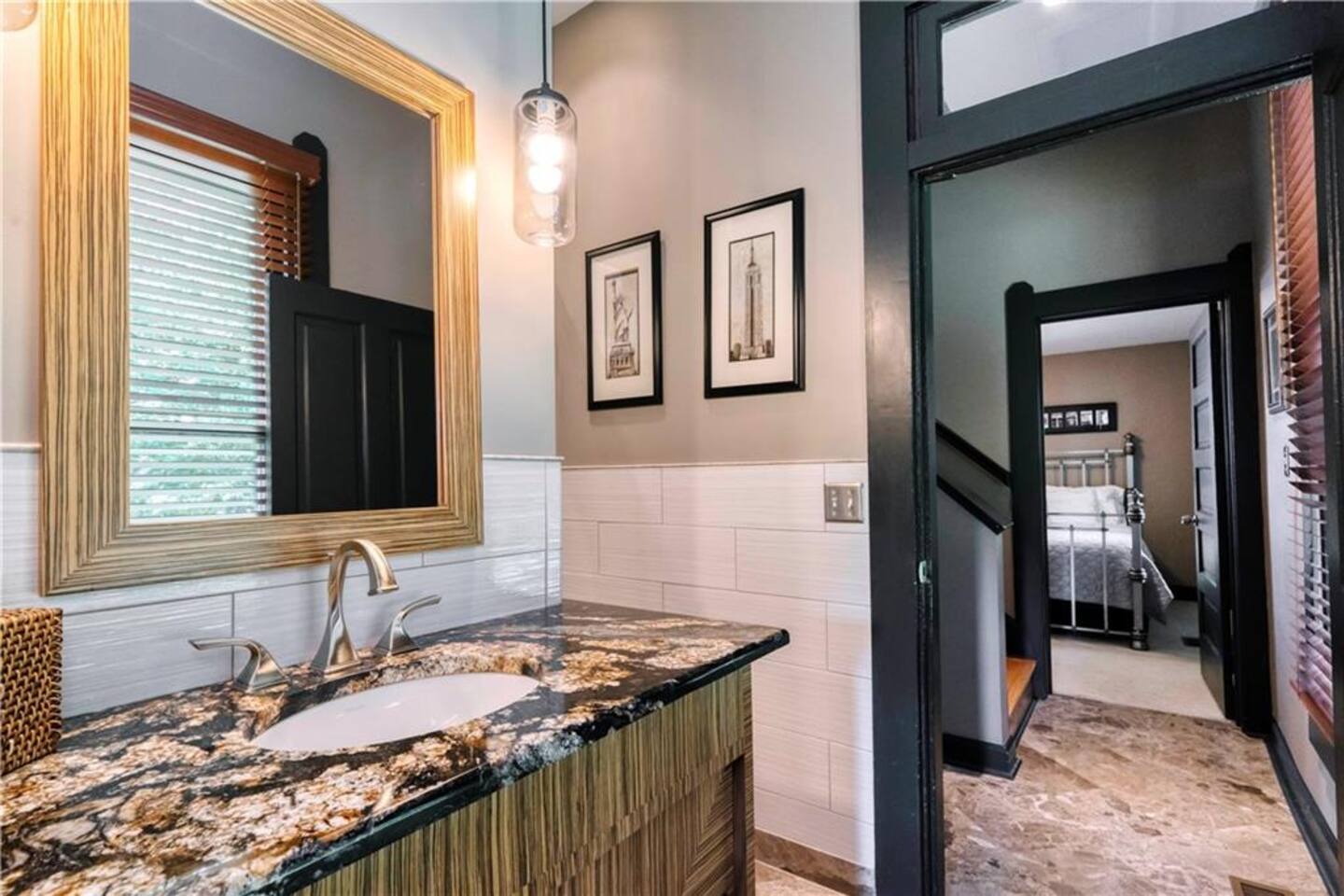 Jack and Jill bathroom between the master bedrooms on the ground floor.
