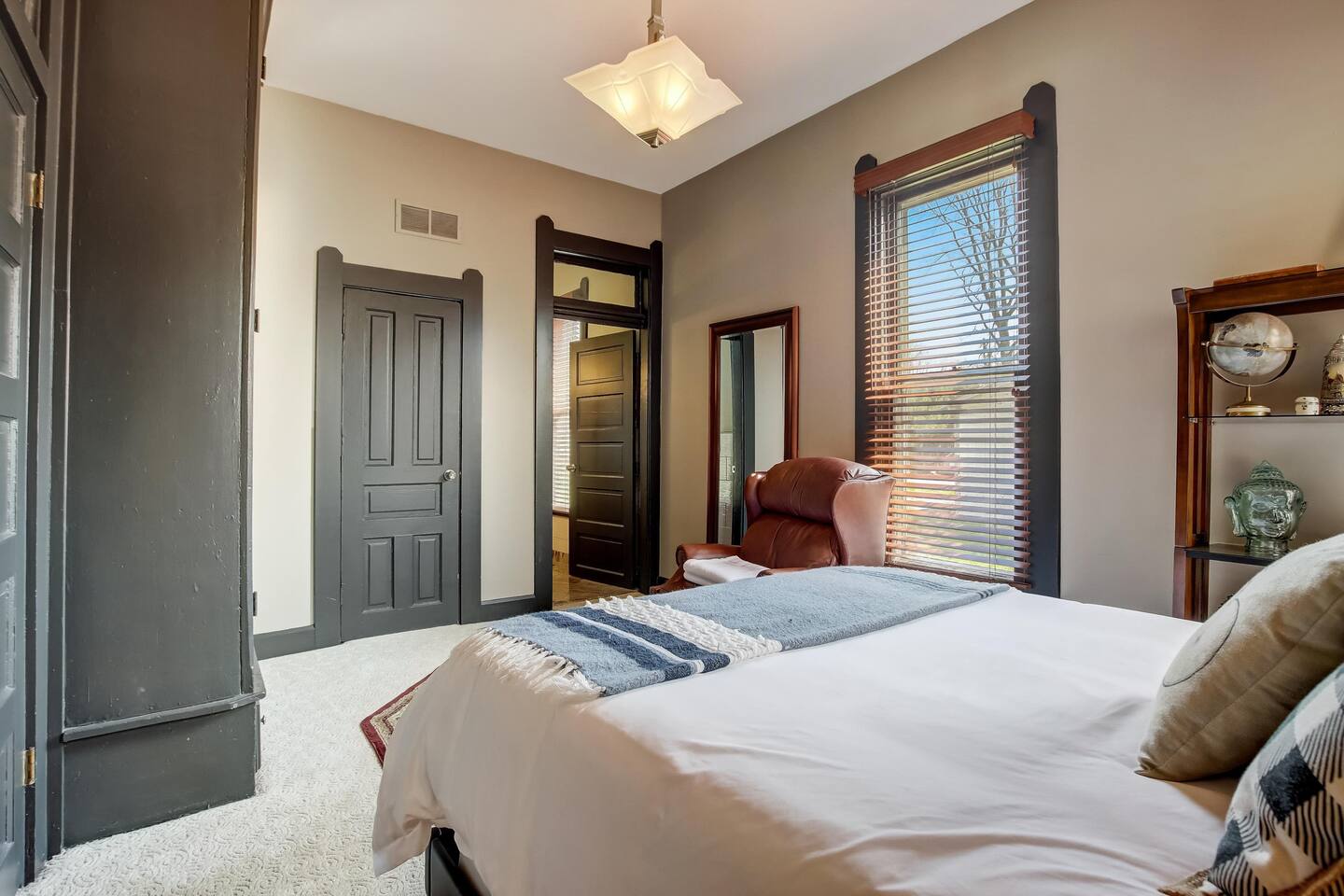 Queen size master bedroom on the ground floor attached to the bathroom.