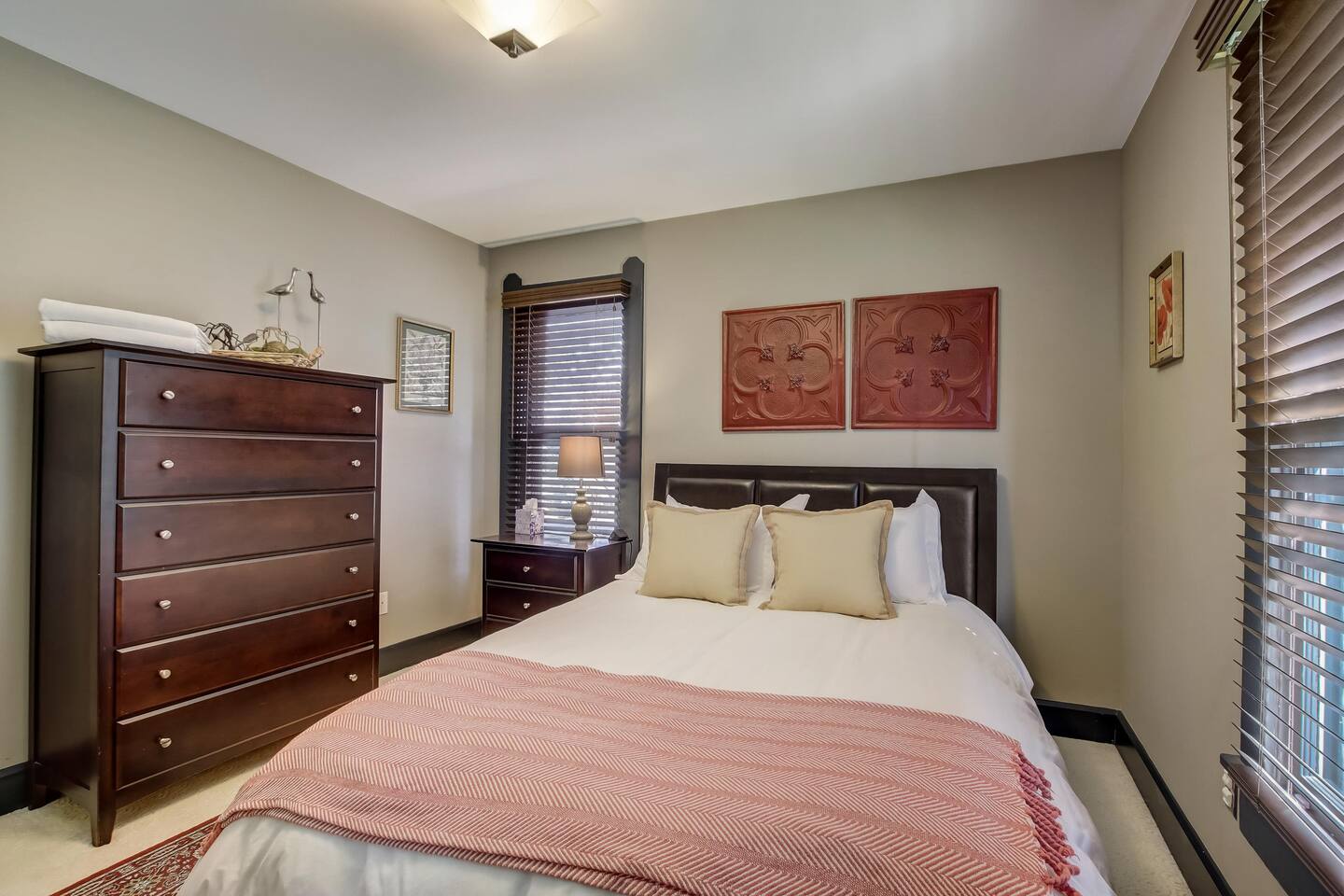 The second queen master on the ground floor with easy access to the shared bathroom.