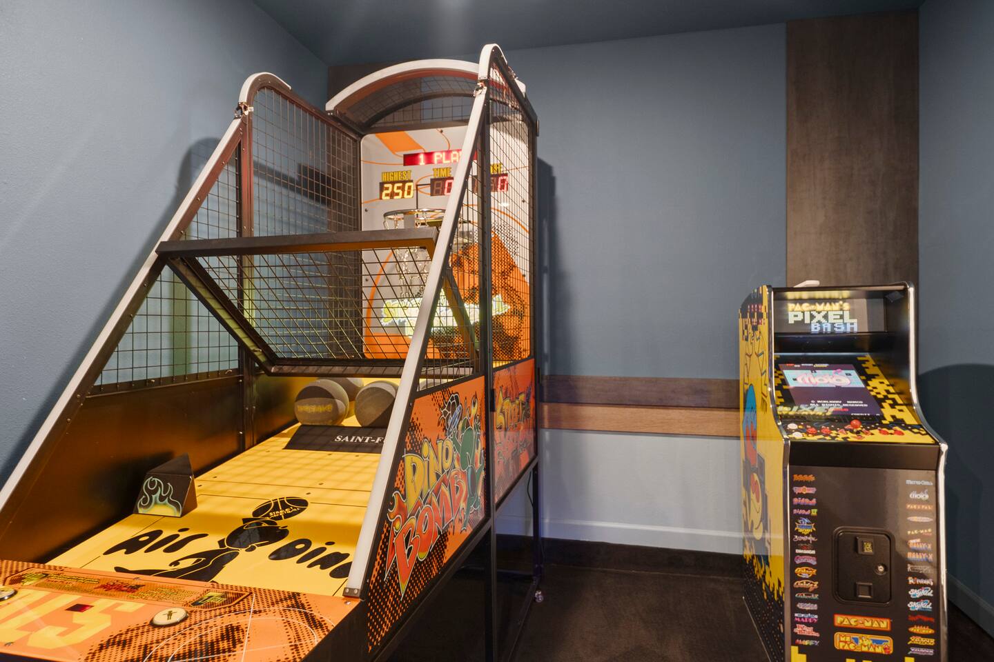 Private game room with arcade basketball and classic Pac-Man fun