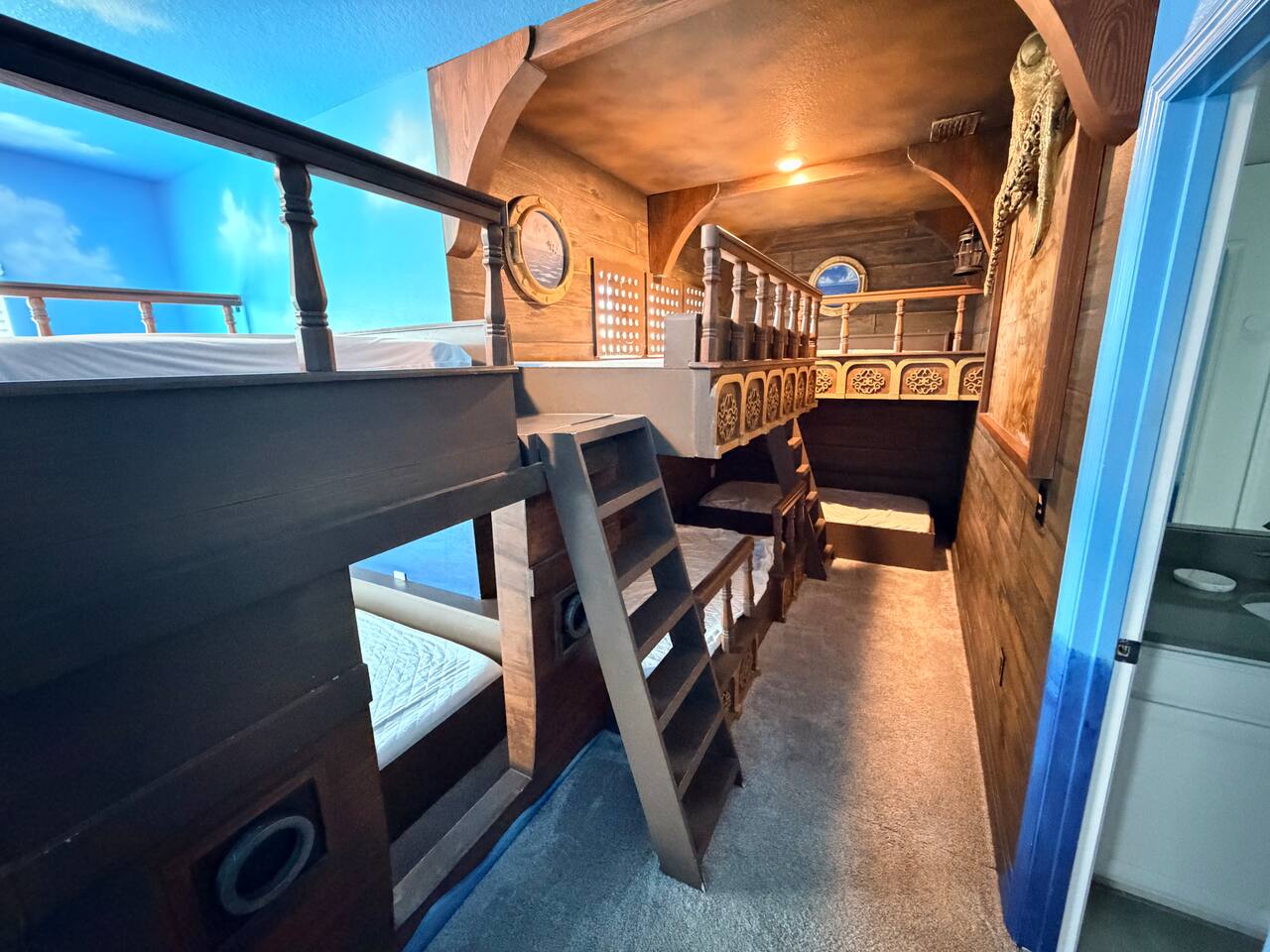 Pirate ship bunk room with custom built-ins for a fun family stay