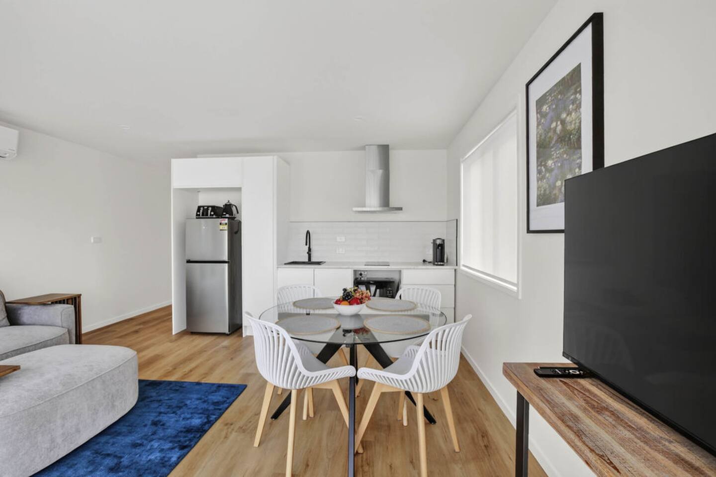 Dining Area: Bright and stylish space for meals, featuring a sleek table and modern decor!