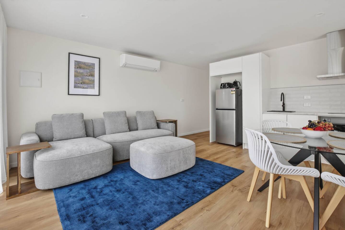 Living Room: Bright and airy space, perfect for relaxation with plush seating and modern decor!