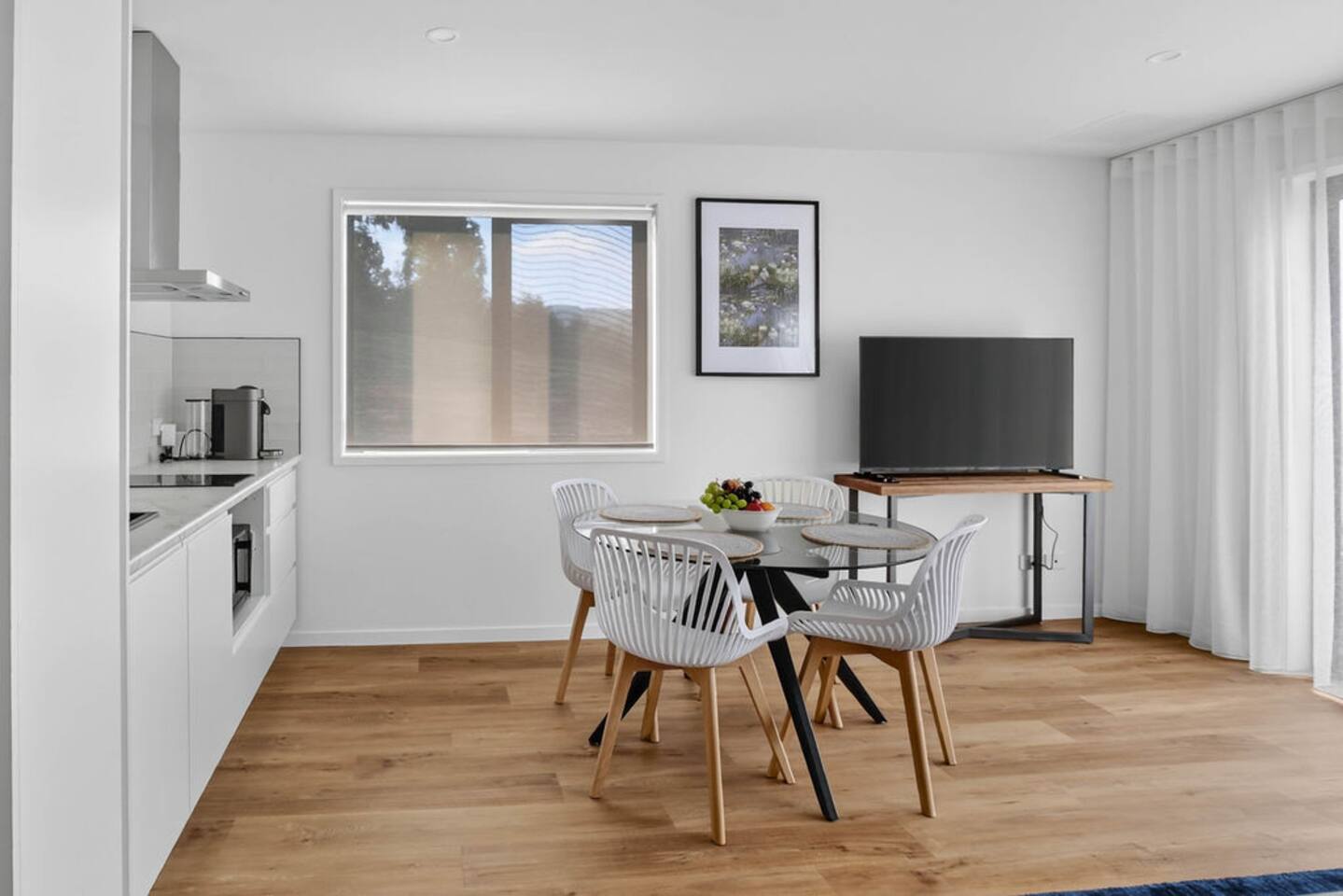Kitchen: Modern design with sleek appliances and bright natural light for culinary adventures!