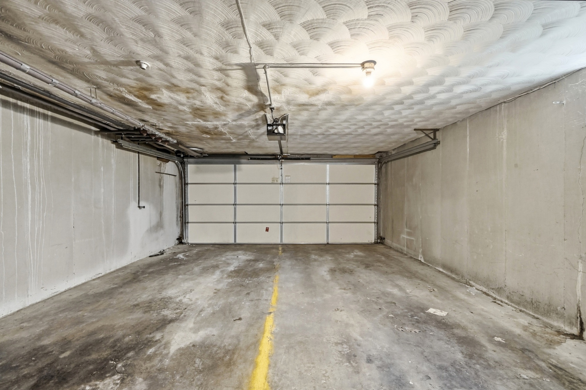 Spacious private garage with secure parking and extra storage space