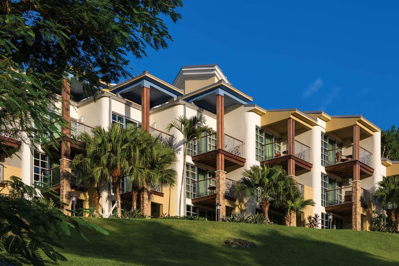 Resort-style hillside stay with private balconies and tropical charm