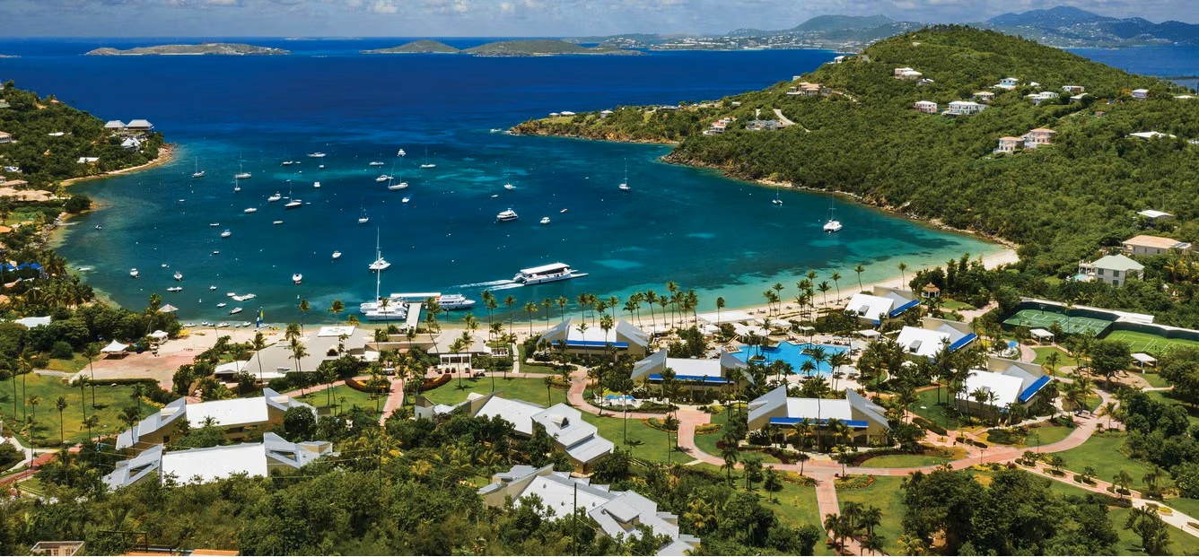 Sweeping bay views, beachfront villas, and a stunning tropical resort setting
