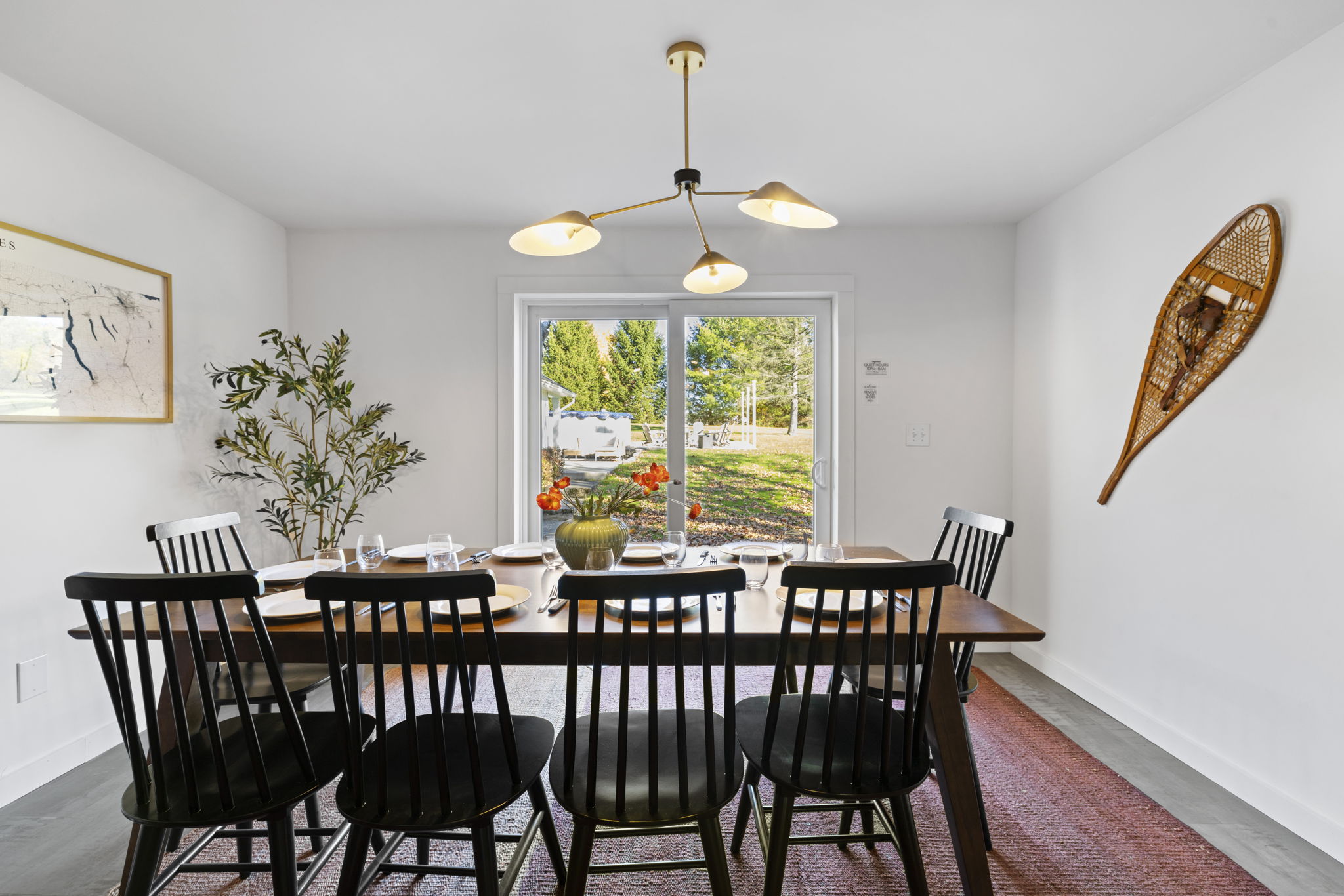 Bright dining room for 6 with backyard views and natural light