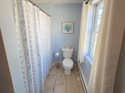 Bright bathroom with natural light and calming coastal touches