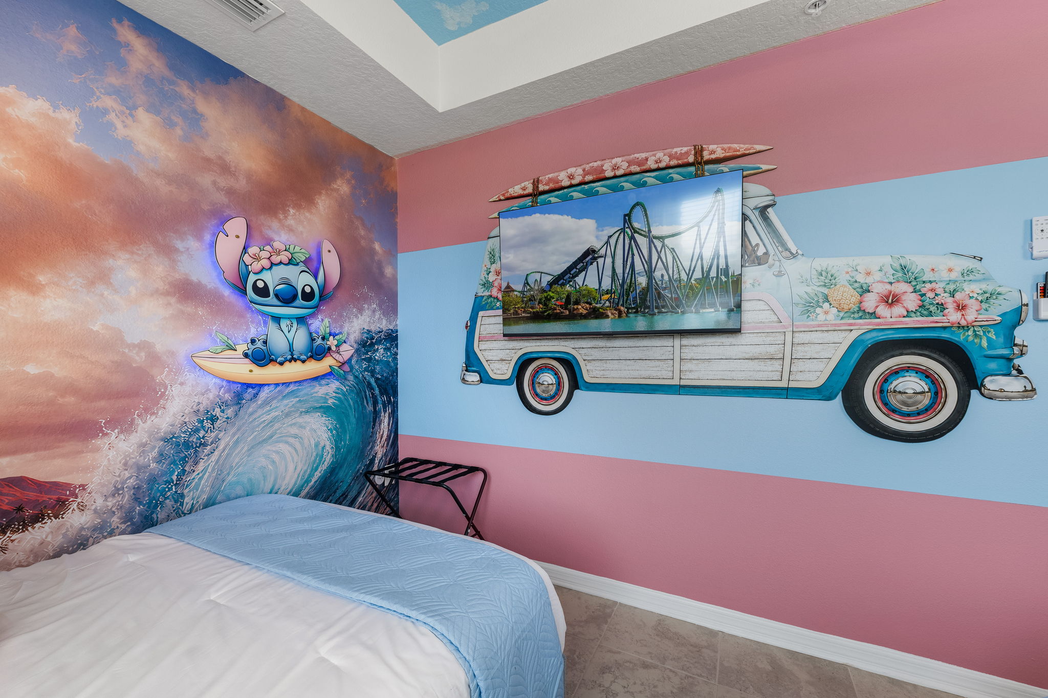 Whimsical themed bedroom with vibrant murals and playful coastal vibes