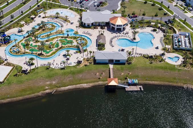 Resort-style pools, lazy river, mini golf, and lakefront views