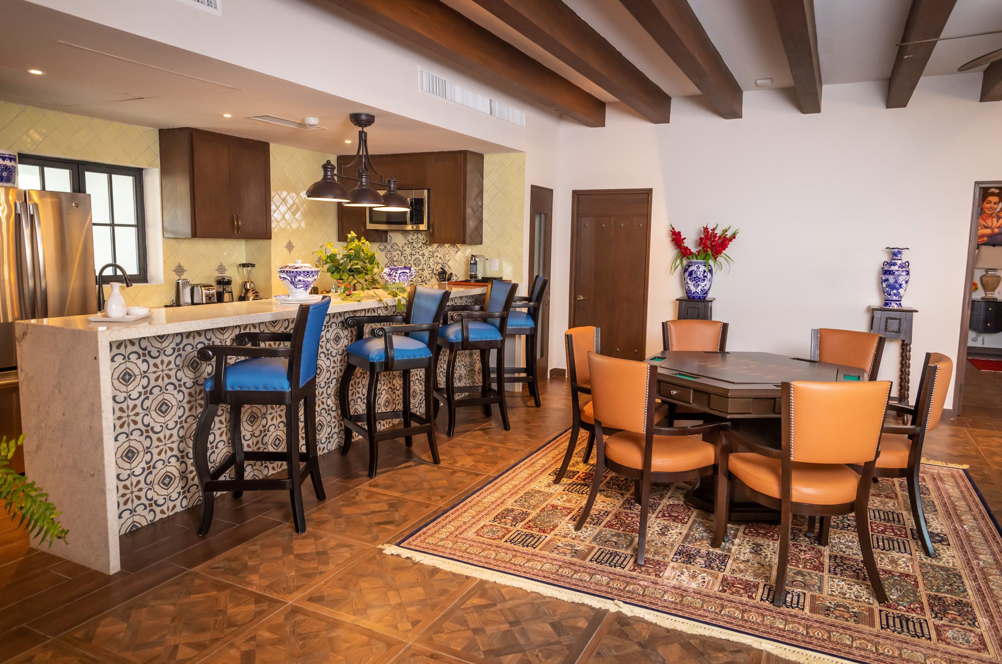 Elegant dining space with breakfast bar and designer kitchen details