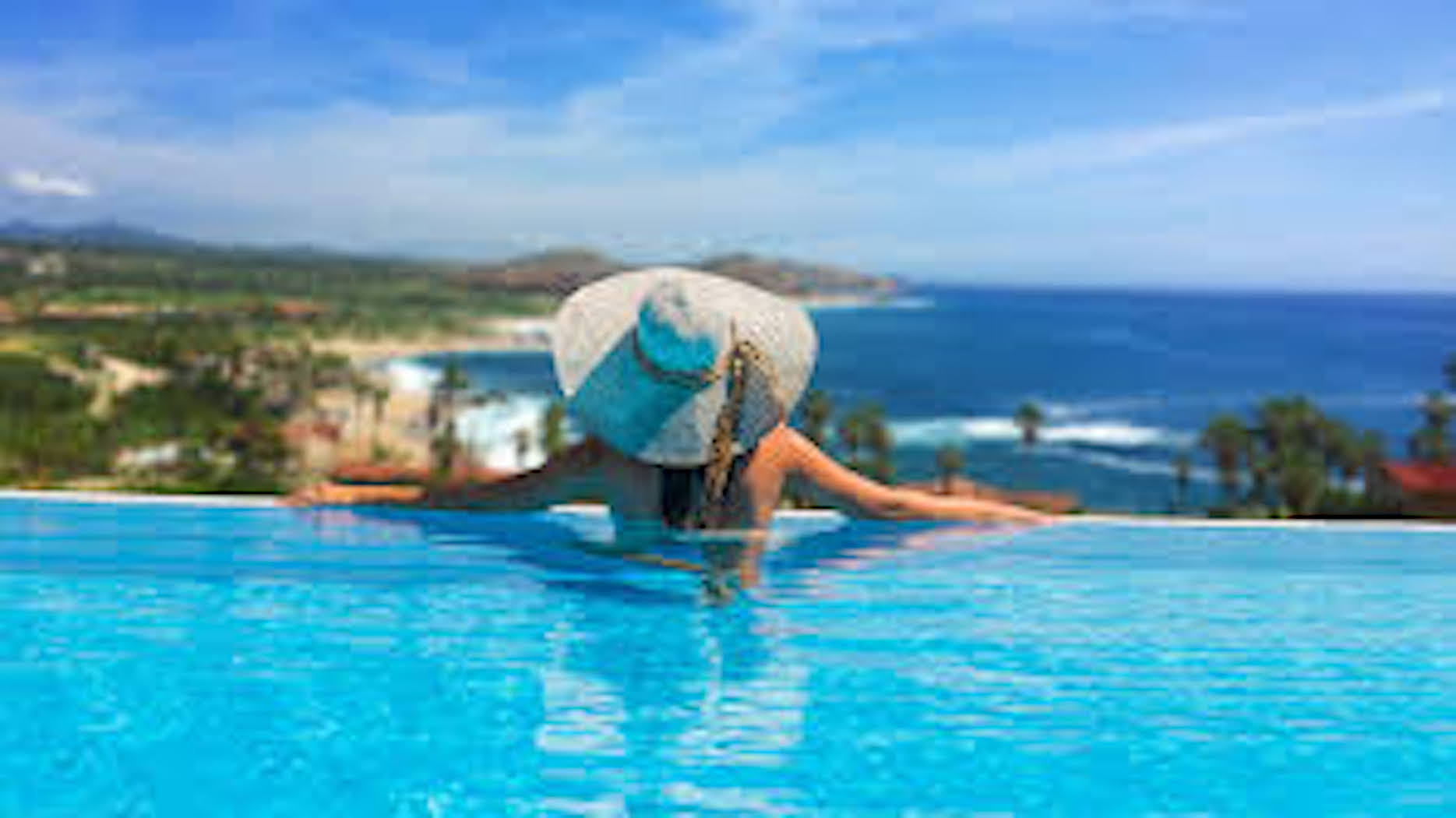 Infinity pool with breathtaking ocean and coastline views