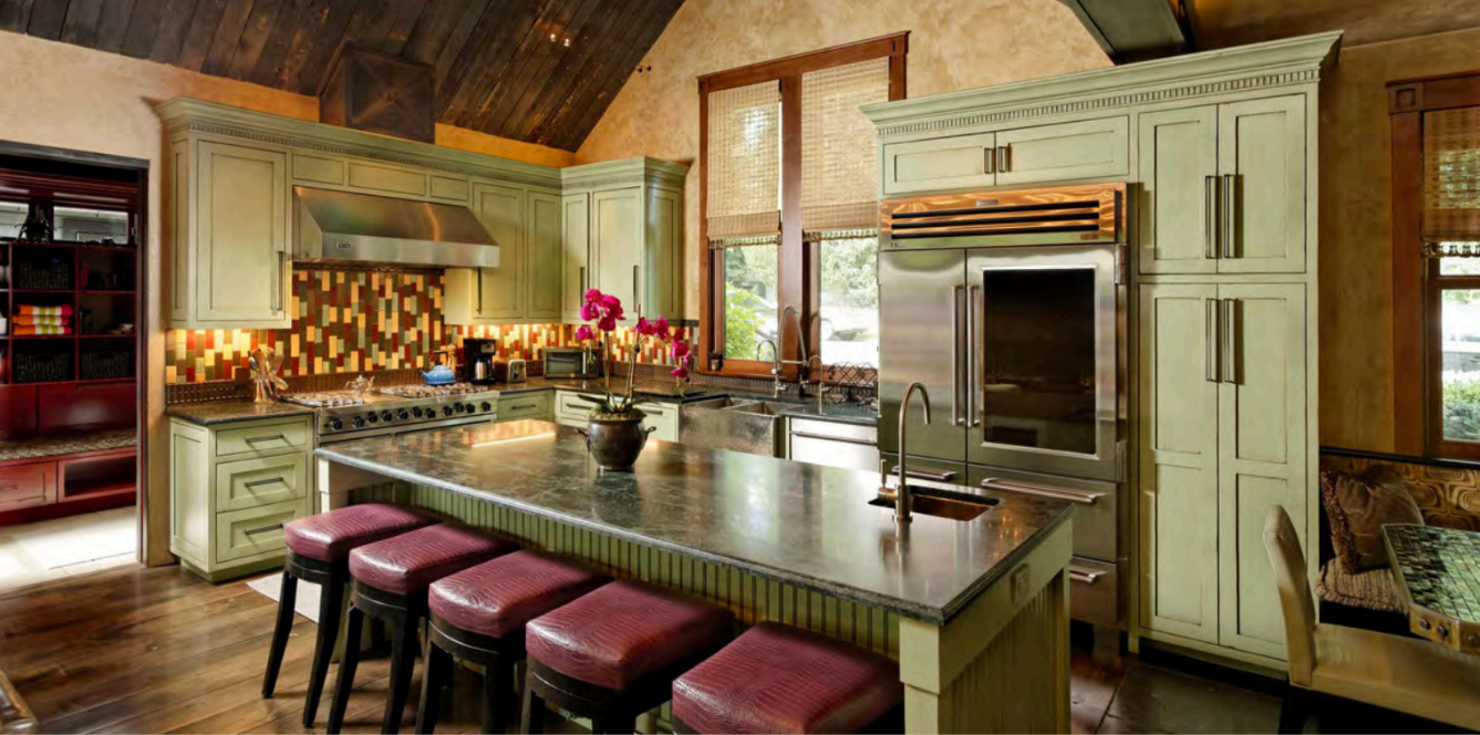 Chef’s kitchen with large island seating and elegant custom finishes
