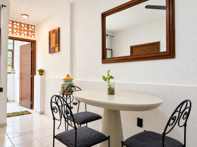 Bright breakfast nook with charming decor and airy natural light