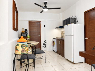 Bright kitchen with full-size appliances and cozy breakfast nook