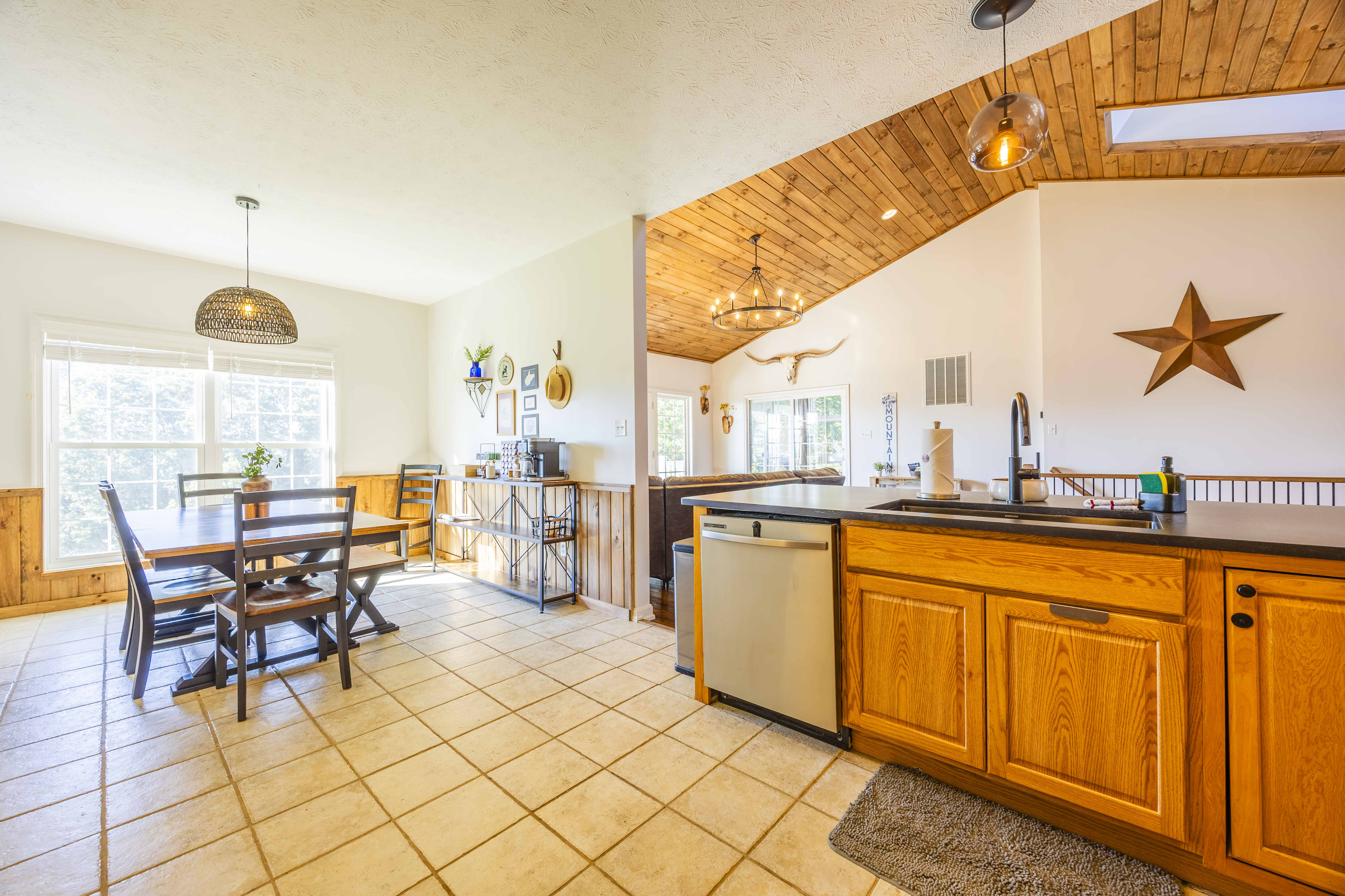 Bright open kitchen and dining space with rustic charm
