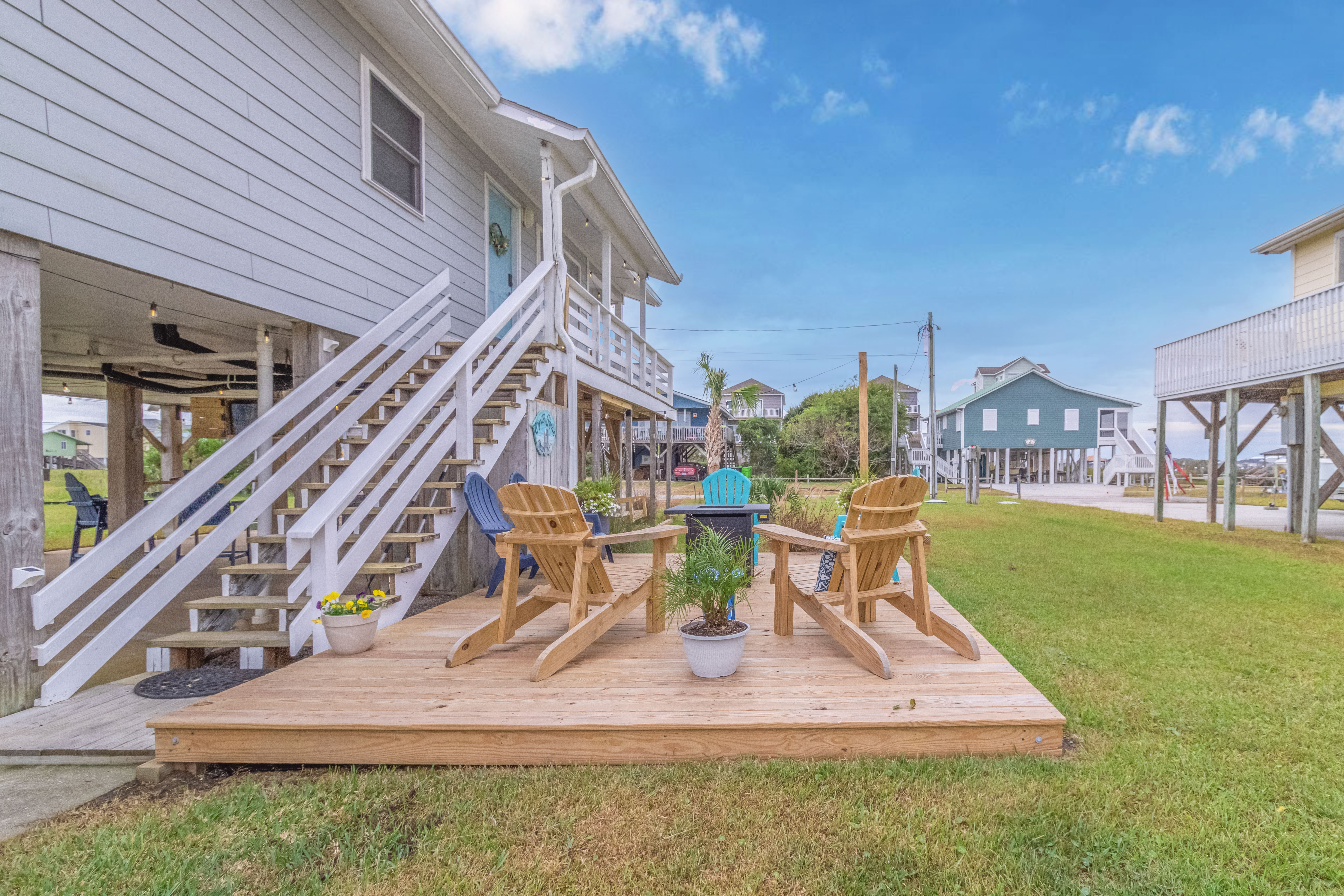 Relax on the private deck with rocking chairs and a spacious yard