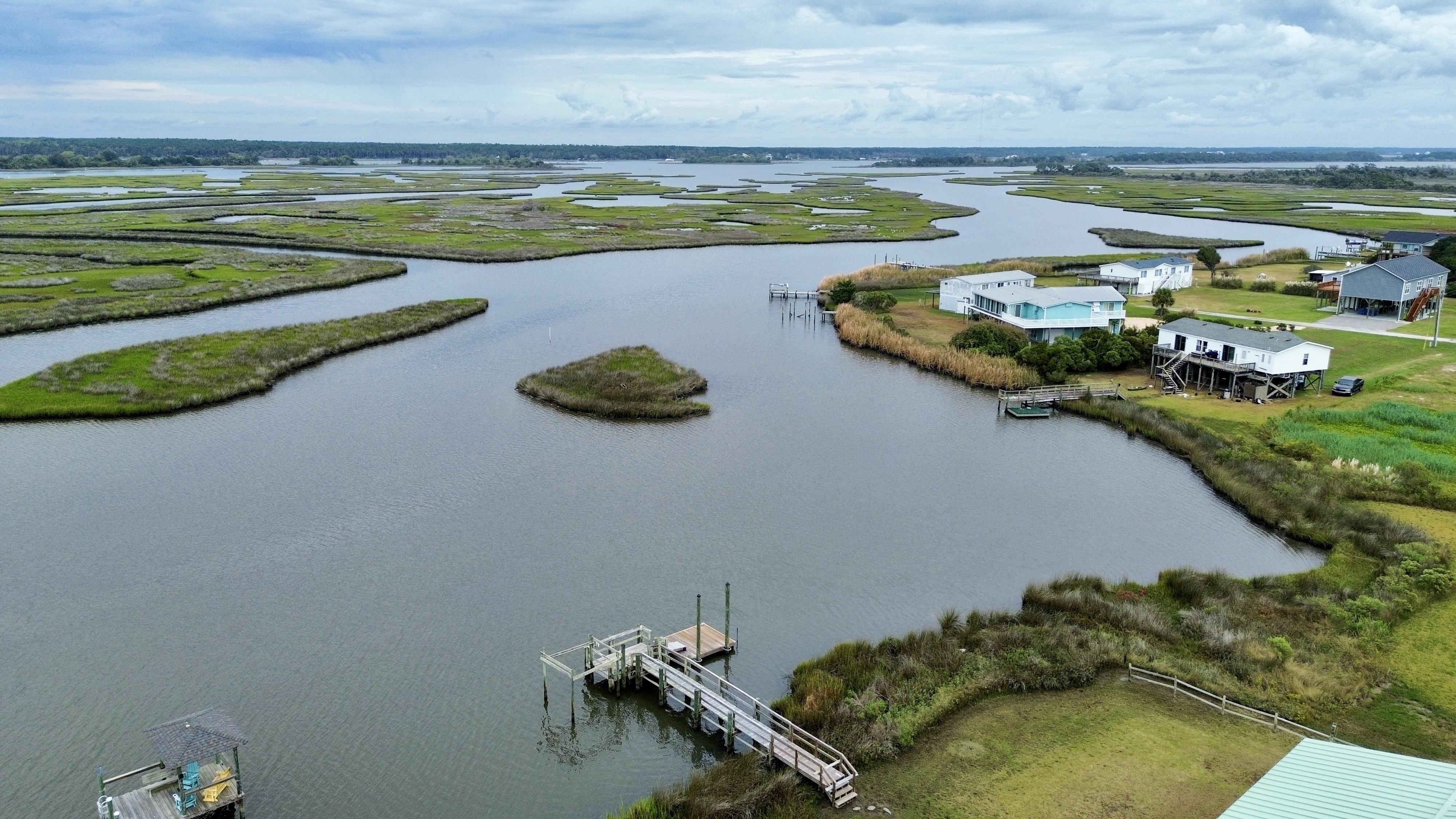 Peaceful marshfront retreat with private dock and sweeping water views