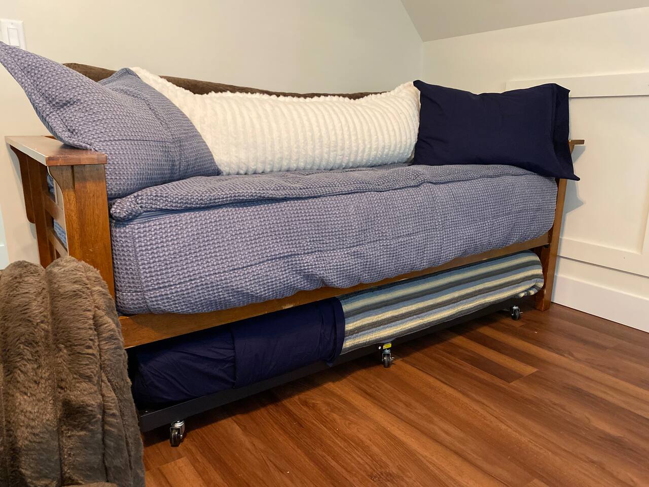 Comfortable daybed with a twin sized trundle underneath allows for sleeping 2 in the loft