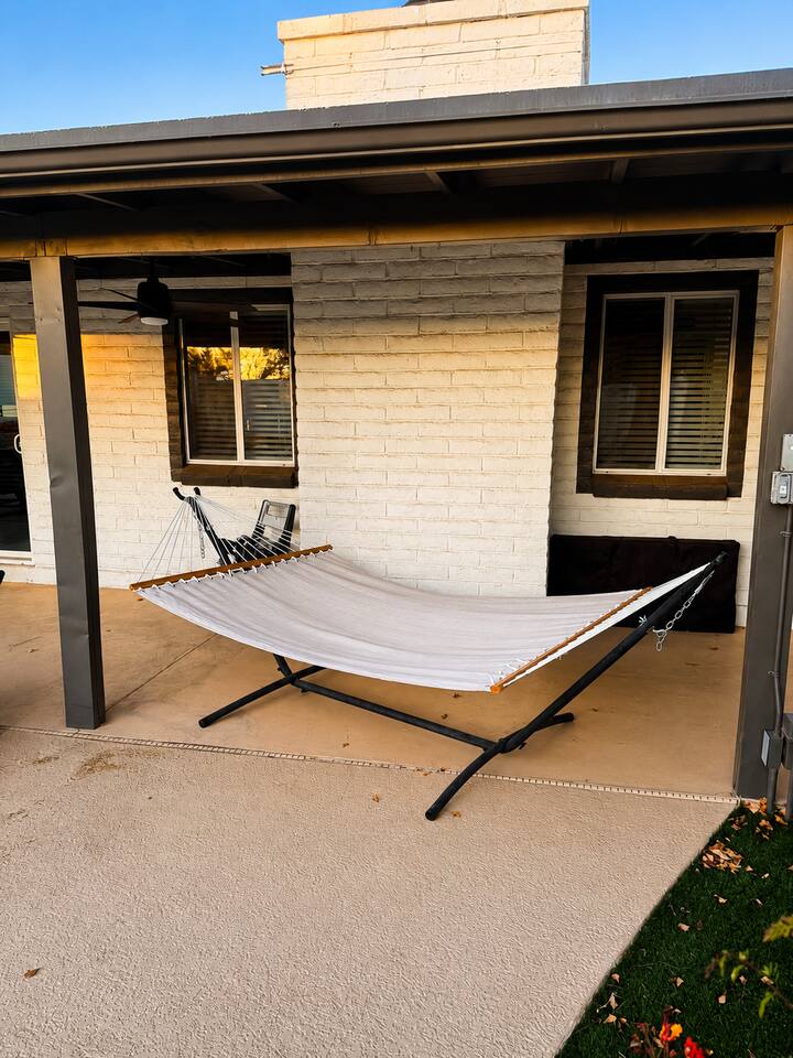 Poolside Hammock: Unwind in the comfortable hammock tucked beneath the covered patio, just steps from the pool. It’s the perfect spot to read a book, take an afternoon nap, or relax in the shade while enjoying the backyard.