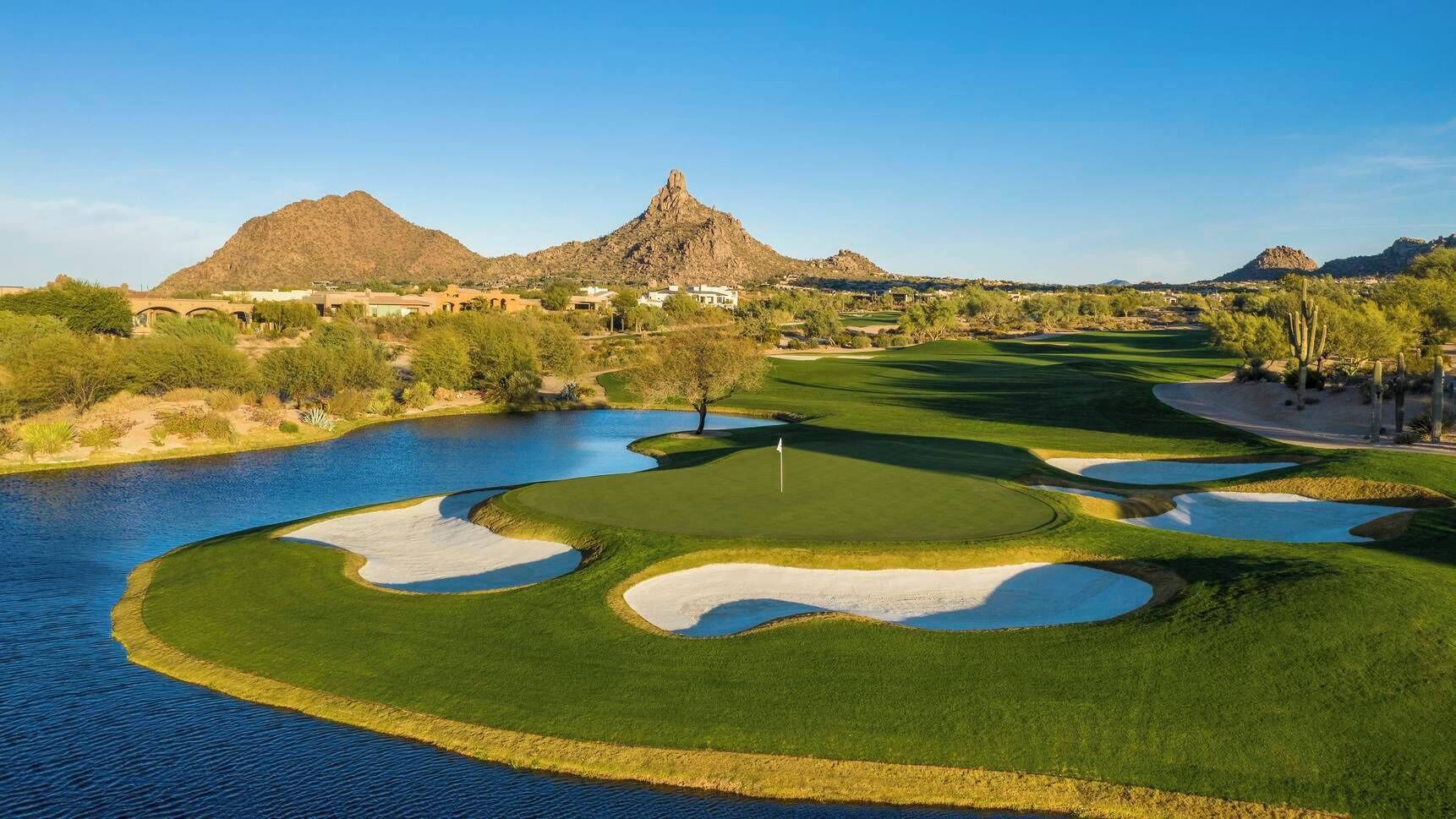 Championship golf courses showcase dramatic mountain desert backdrops.