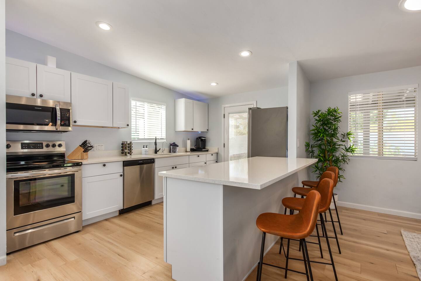Bright, open, and ready for connection — this kitchen invites everyone to gather, cook, and linger. With plenty of prep space and bar seating for four, it’s where mornings begin and evenings come together.